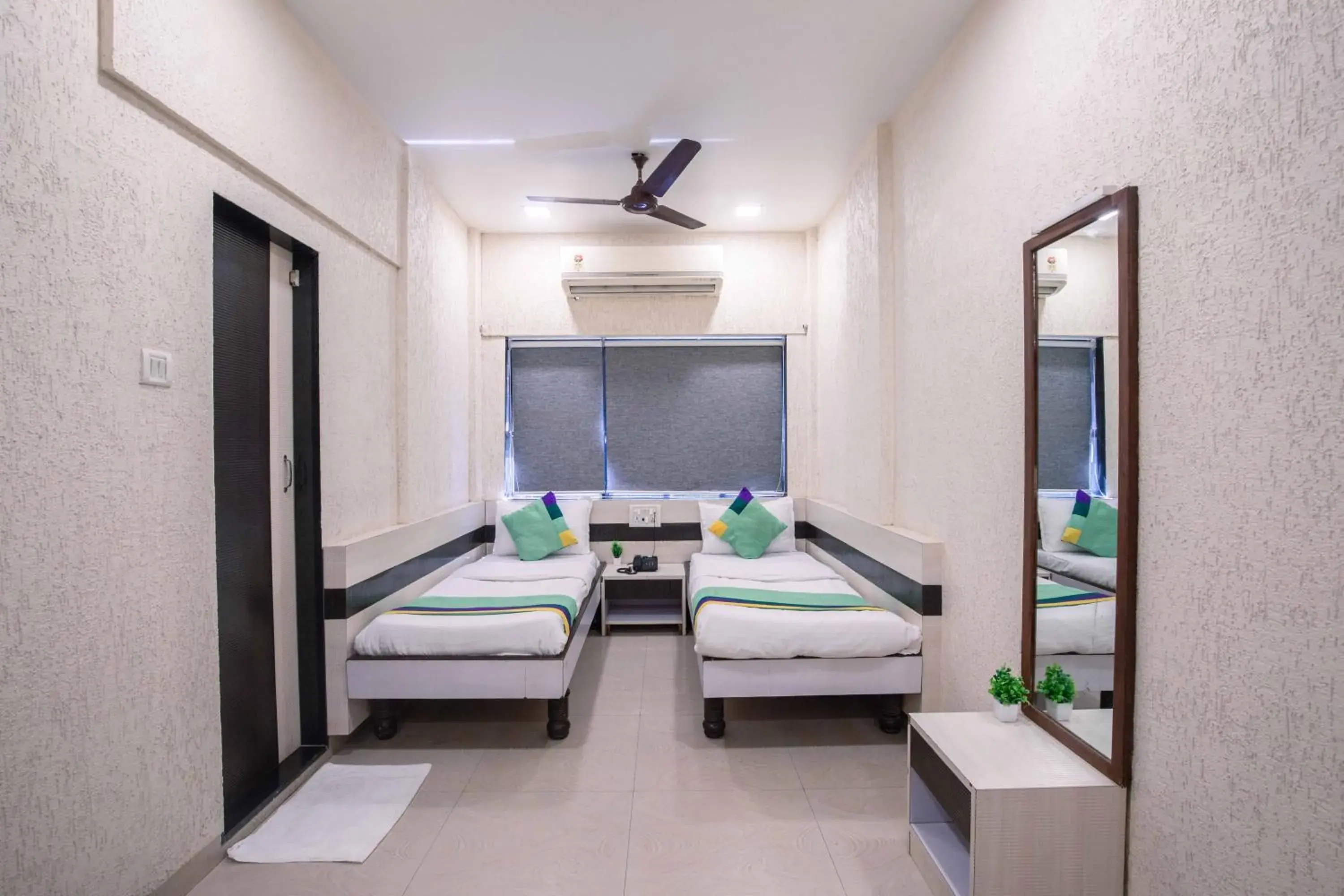 Bedroom, Bed in Treebo Hiramani Parel Lalbaug Bedroom, Bed in Treebo Hiramani Parel Lalbaug