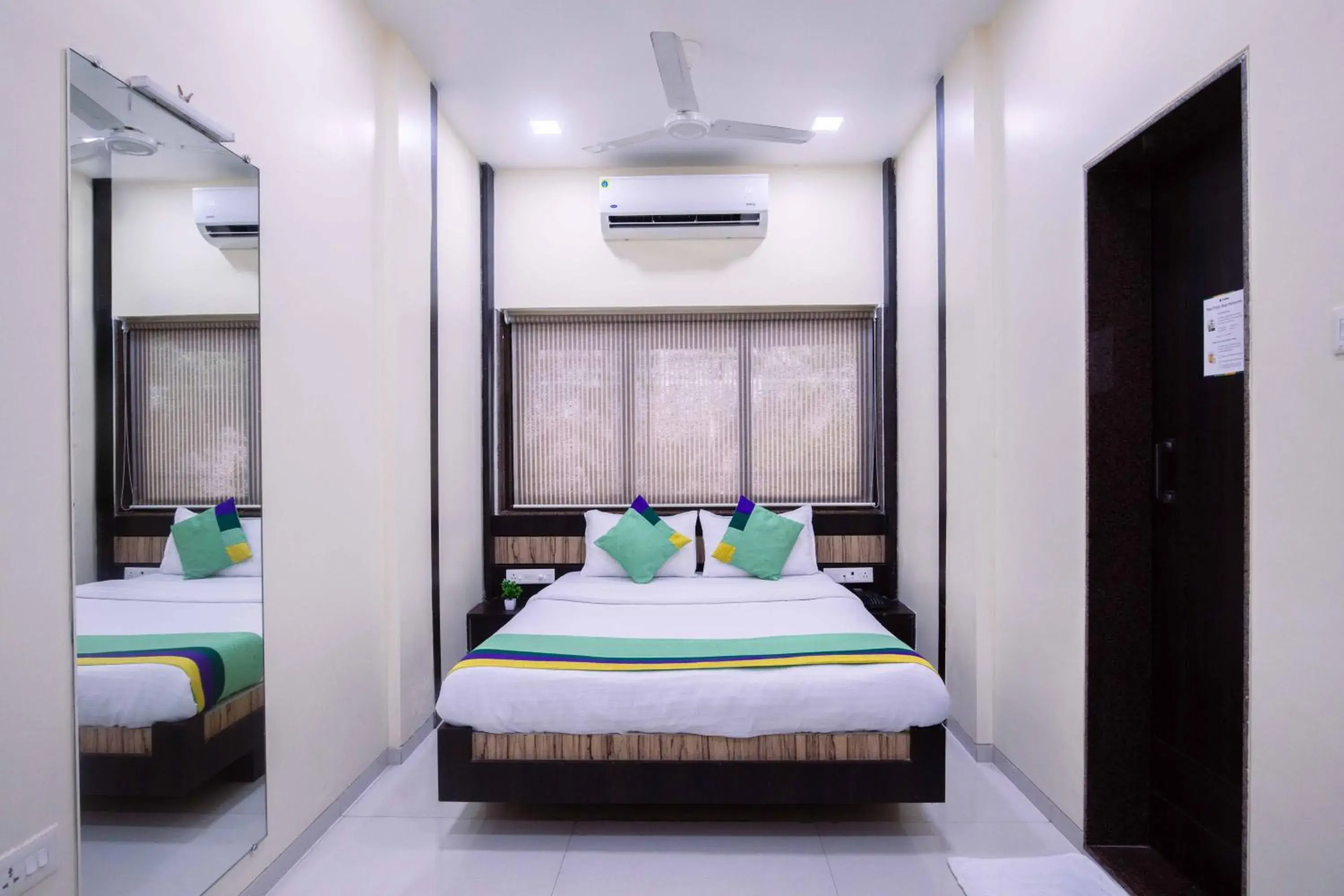 Bedroom, Bed in Treebo Hiramani Parel Lalbaug Bedroom, Bed in Treebo Hiramani Parel Lalbaug