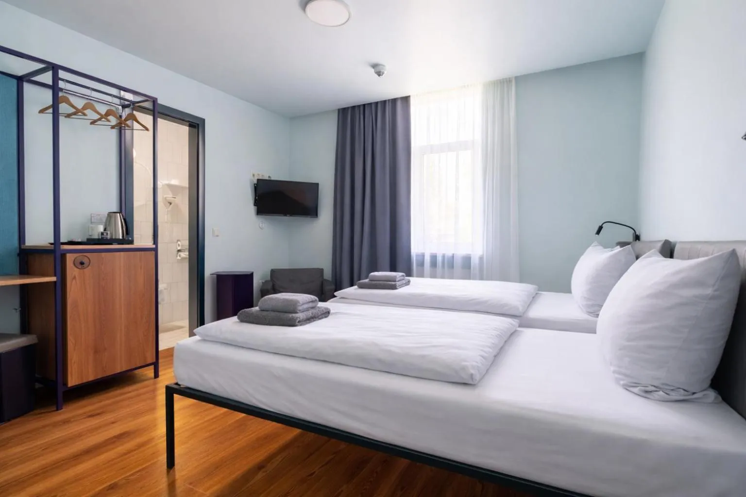 Photo of the whole room, Bed in Das Schreder Hotel - Munich Free Parking