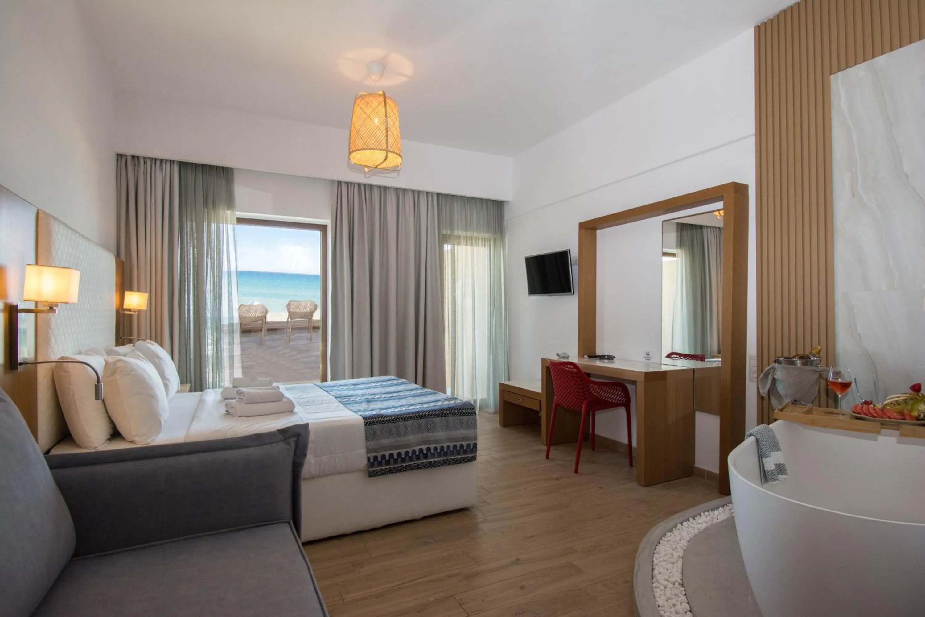 Photo of the whole room, Bed in Yianna Caravel Suites "by Checkin" adults only