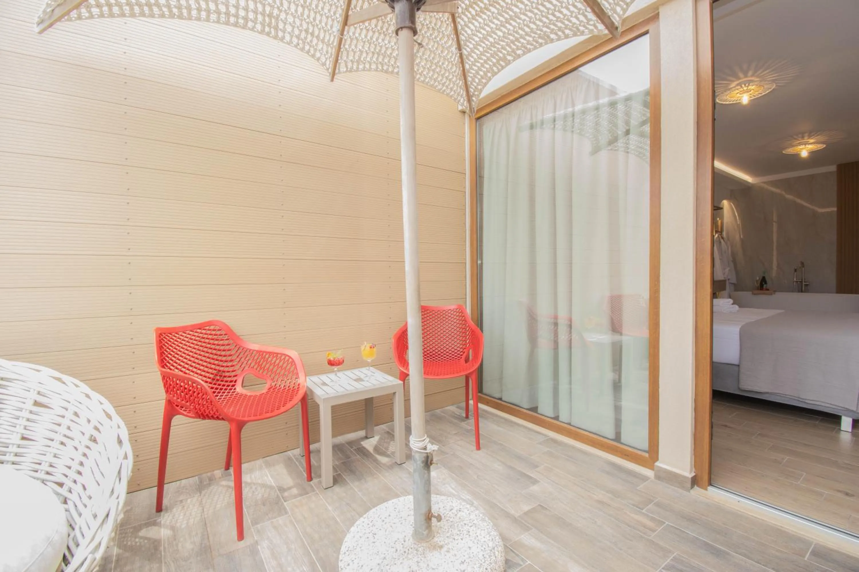 Patio, Bed in Yianna Caravel Suites "by Checkin" adults only