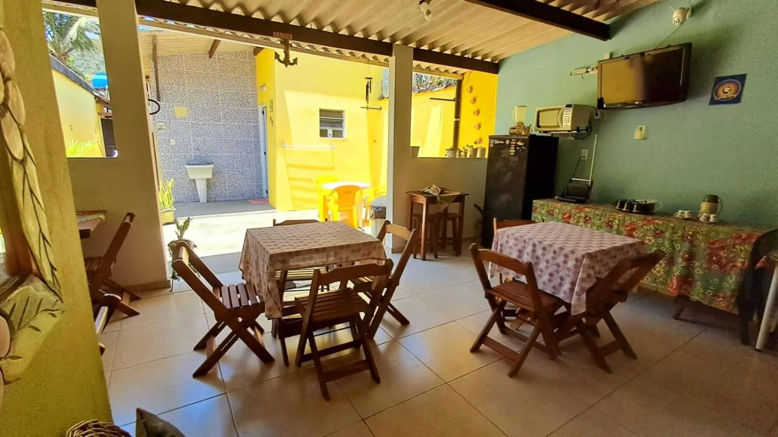 Communal lounge/ TV room in Suítes Cantinho do Sossego em Ubatuba