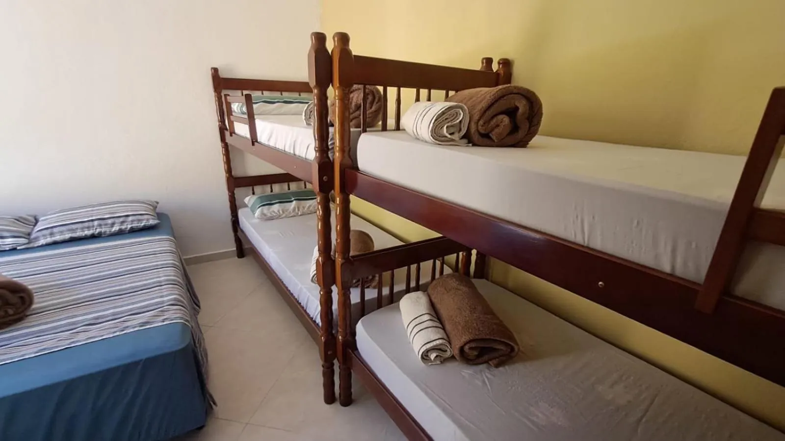 Bed in Suítes Cantinho do Sossego Ubatuba