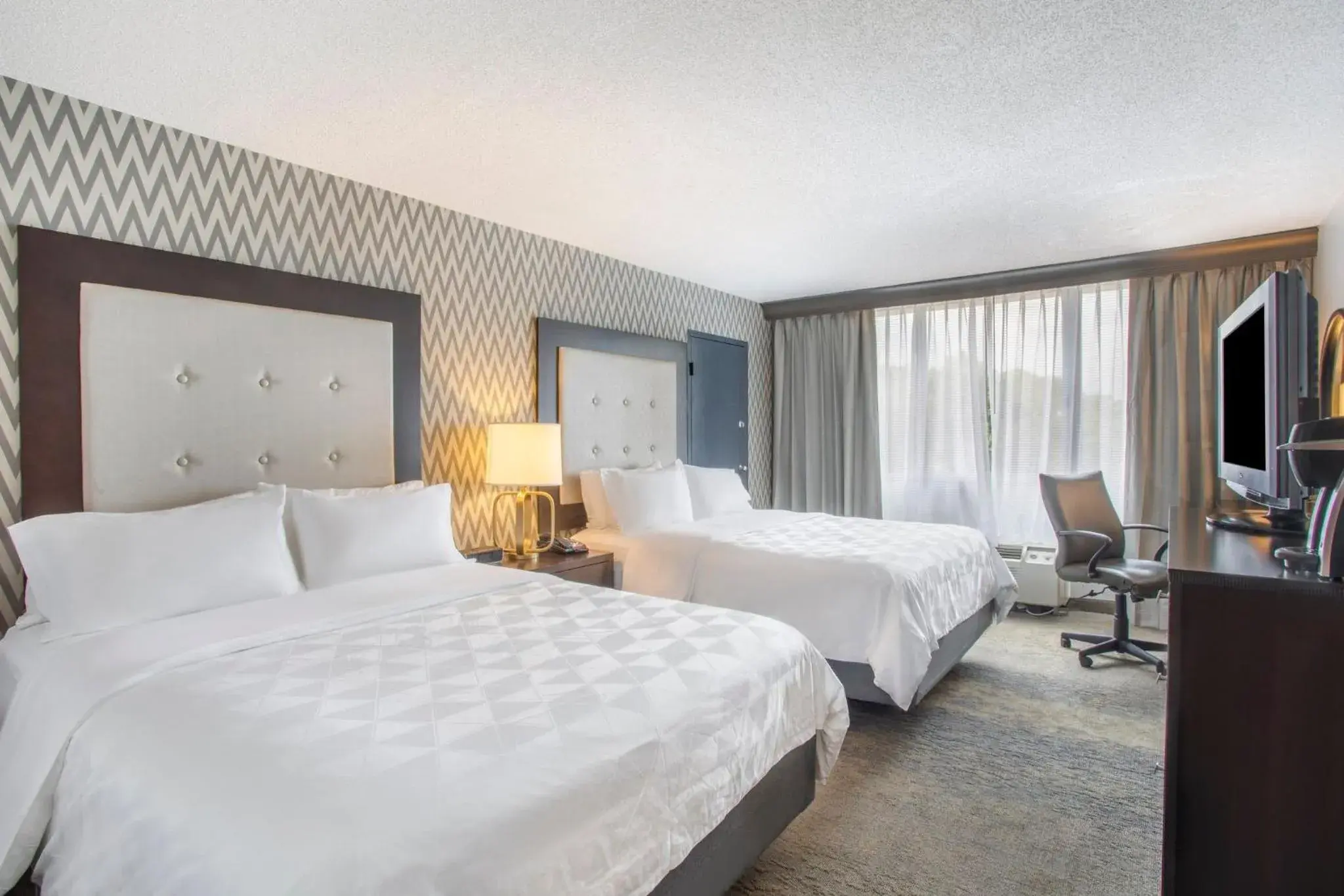 Photo of the whole room, Bed in Holiday Inn & Suites Parsippany Fairfield by IHG Photo of the whole room, Bed in Holiday Inn & Suites Parsippany Fairfield by IHG