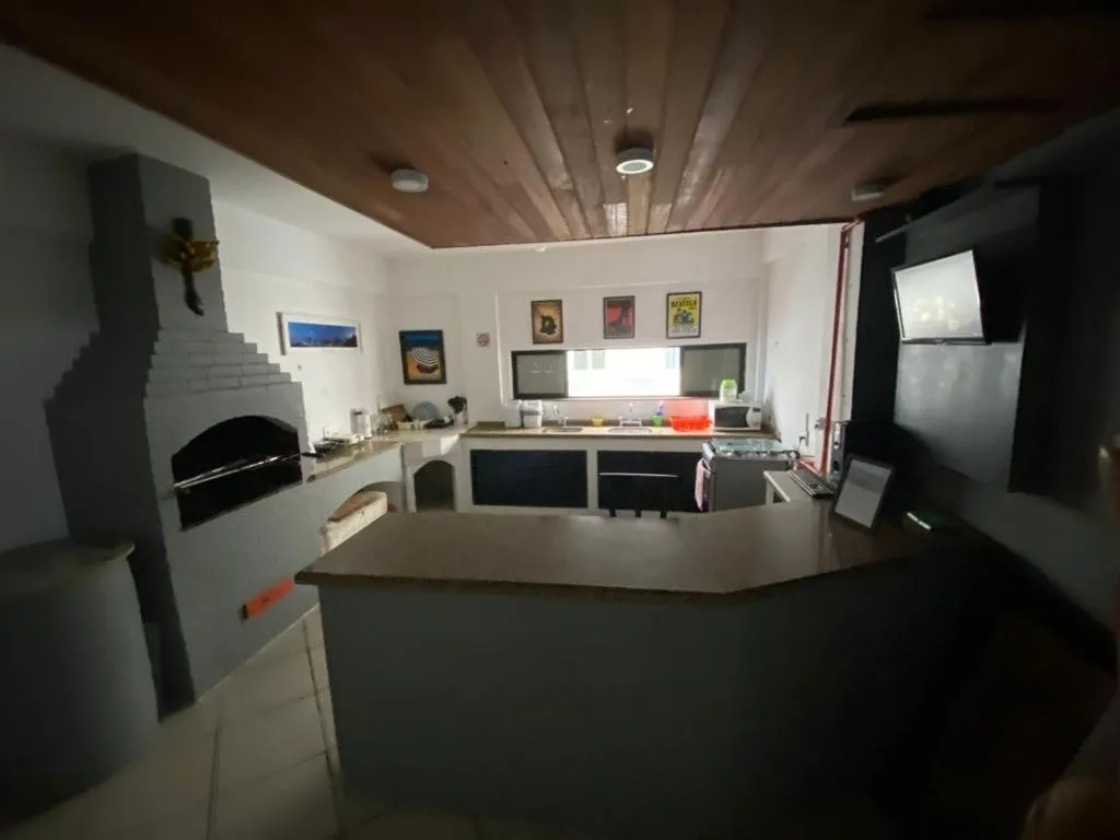 Communal kitchen in Ipanema Club Hostel