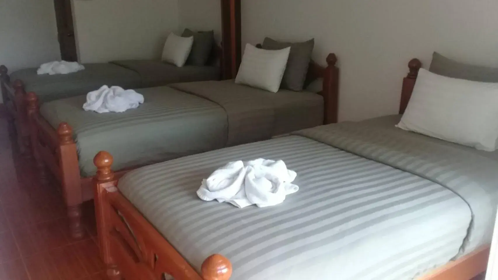 Triple Room with Private Bathroom in Maingern Maithong Resort Triple Room with Private Bathroom in Maingern Maithong Resort