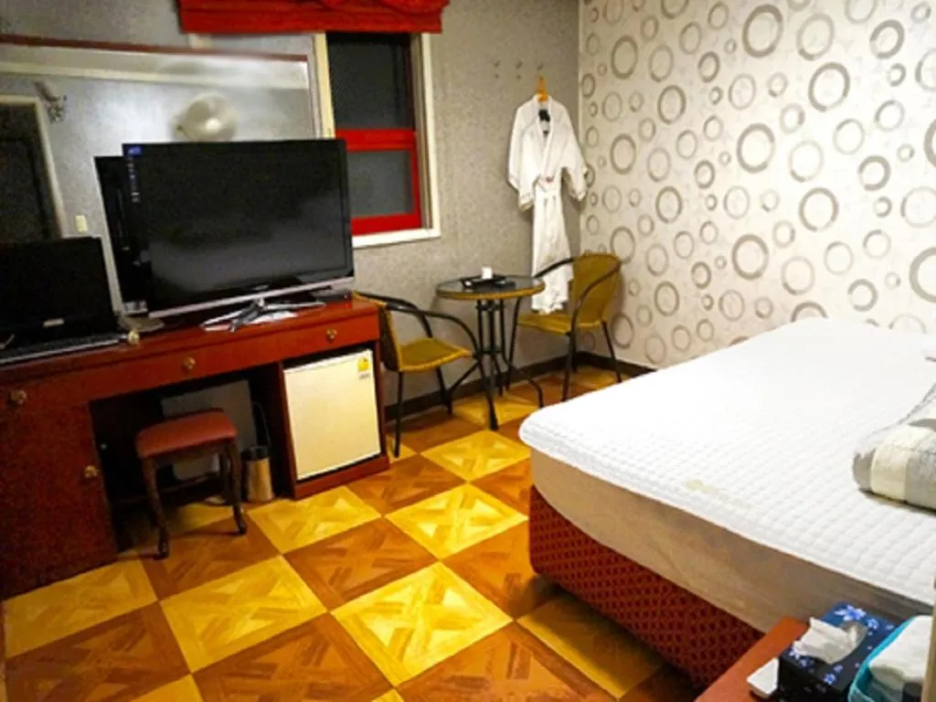 Seating area, Bed in J Motel Gwangalli Busan