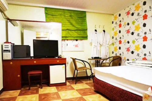 Seating area, Bed in J Motel Gwangalli Busan