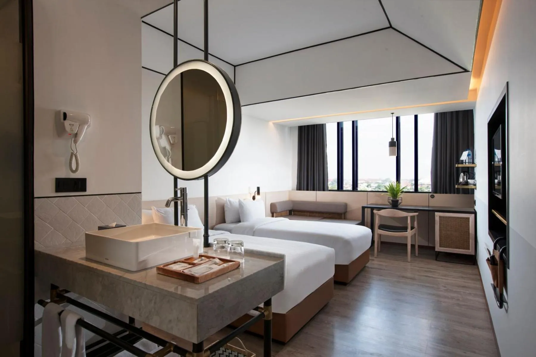 Bed in GAIA Cosmo Hotel