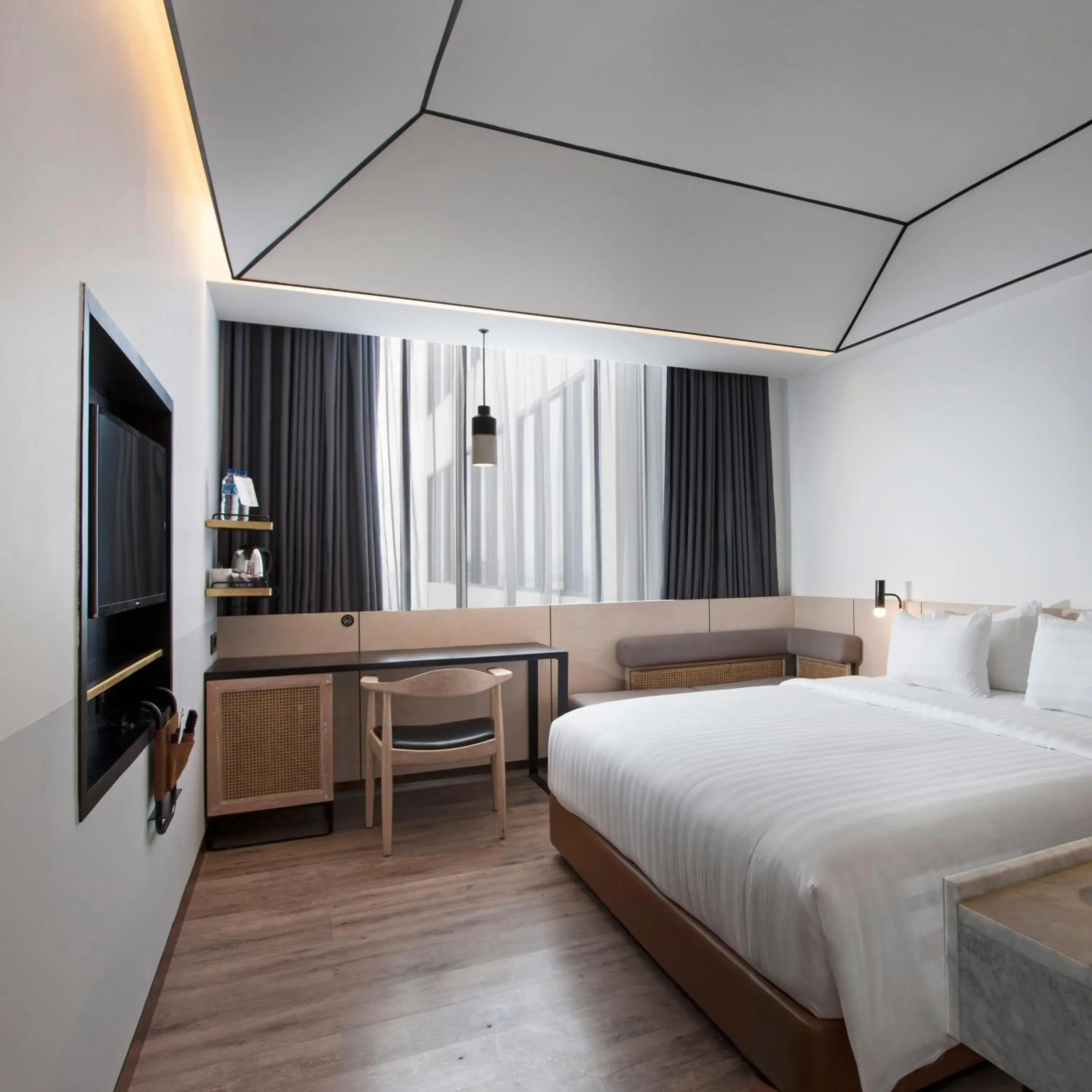 Bed in GAIA Cosmo Hotel Bed in GAIA Cosmo Hotel