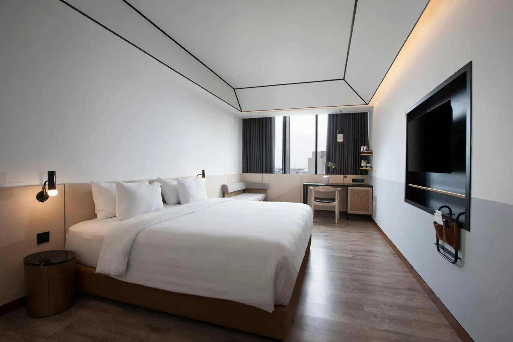 Bed in GAIA Cosmo Hotel Bed in GAIA Cosmo Hotel