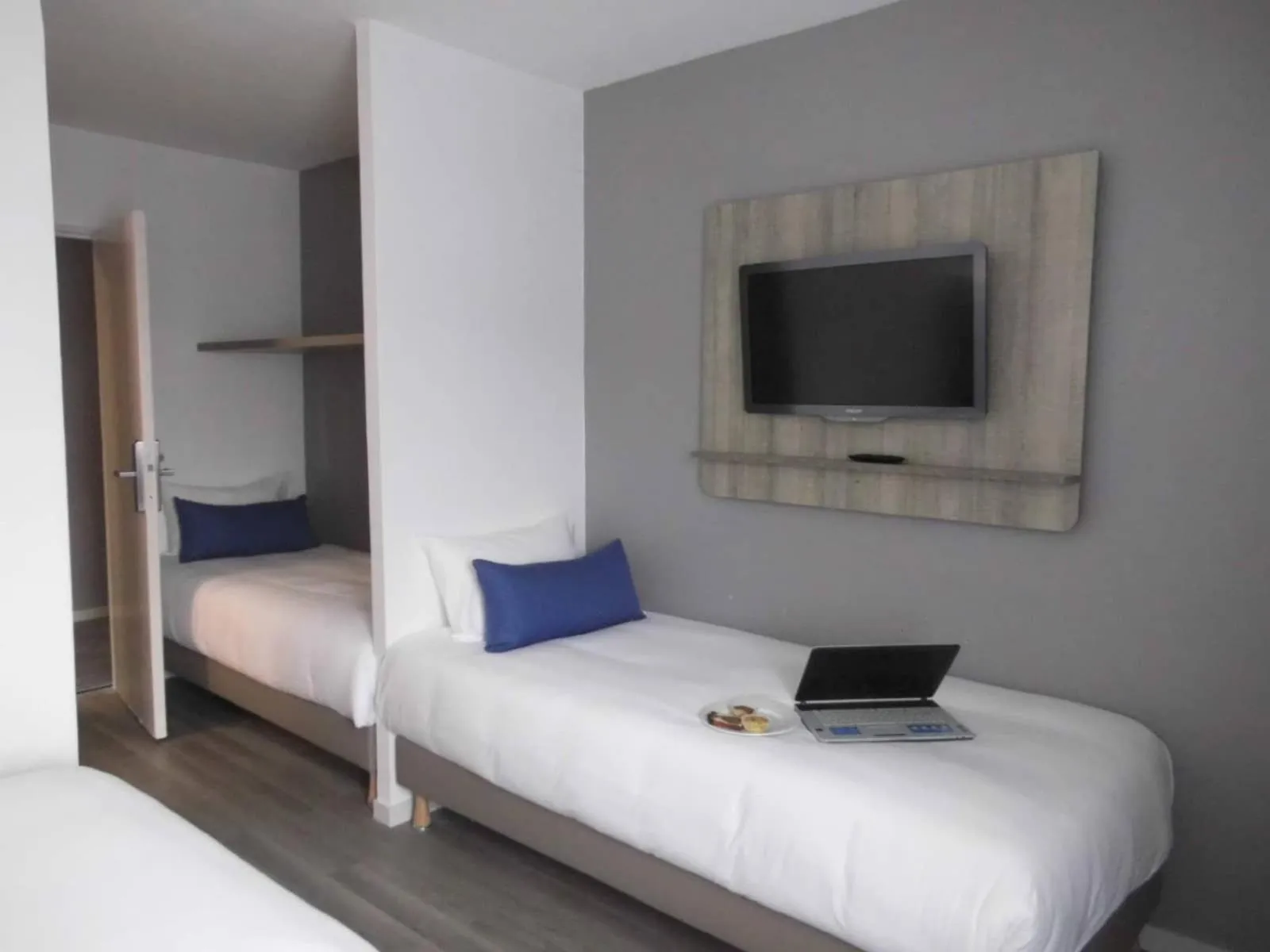 Bed in Hotel Le Circuit Le Mans