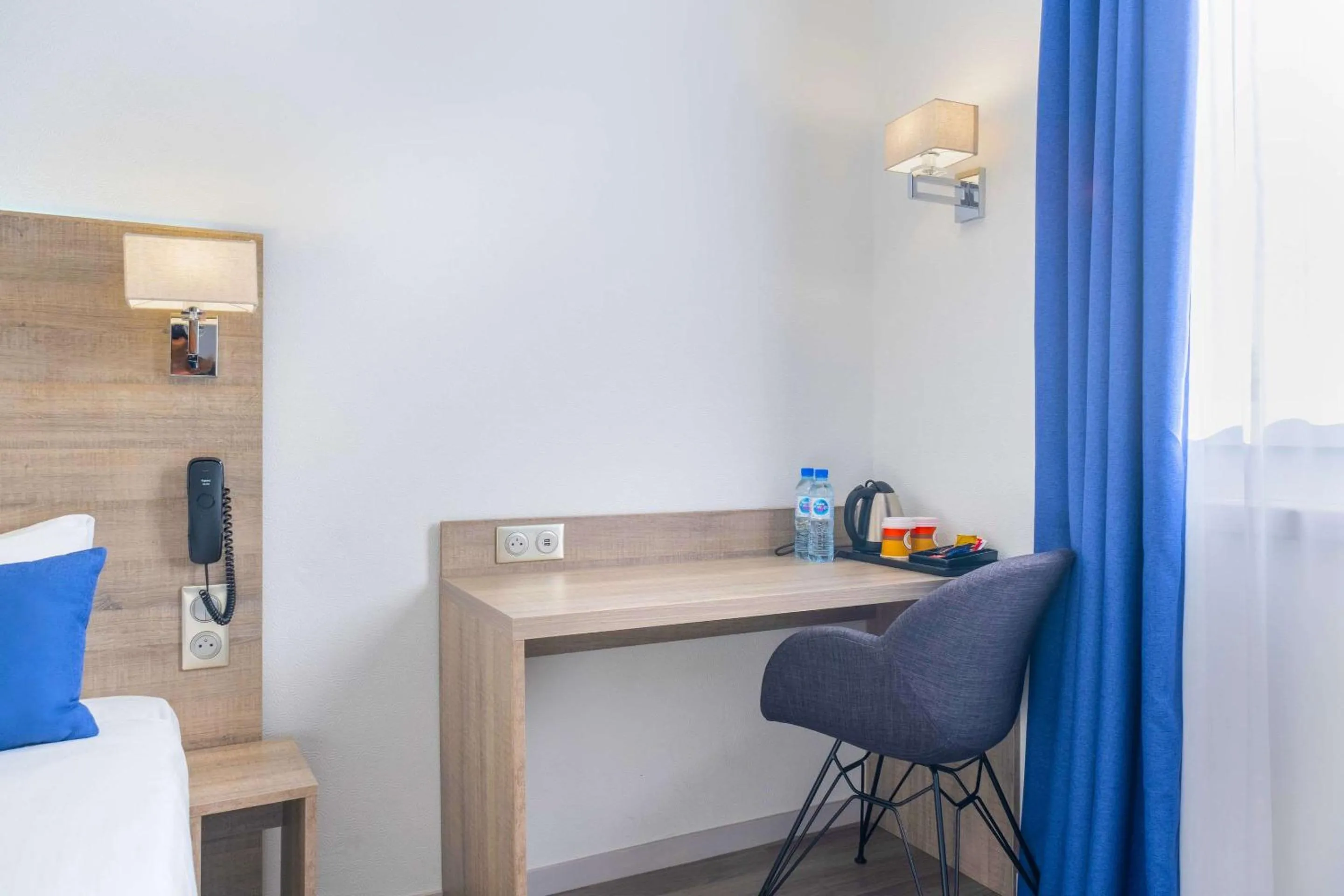 Photo of the whole room in Hotel Le Circuit Le Mans