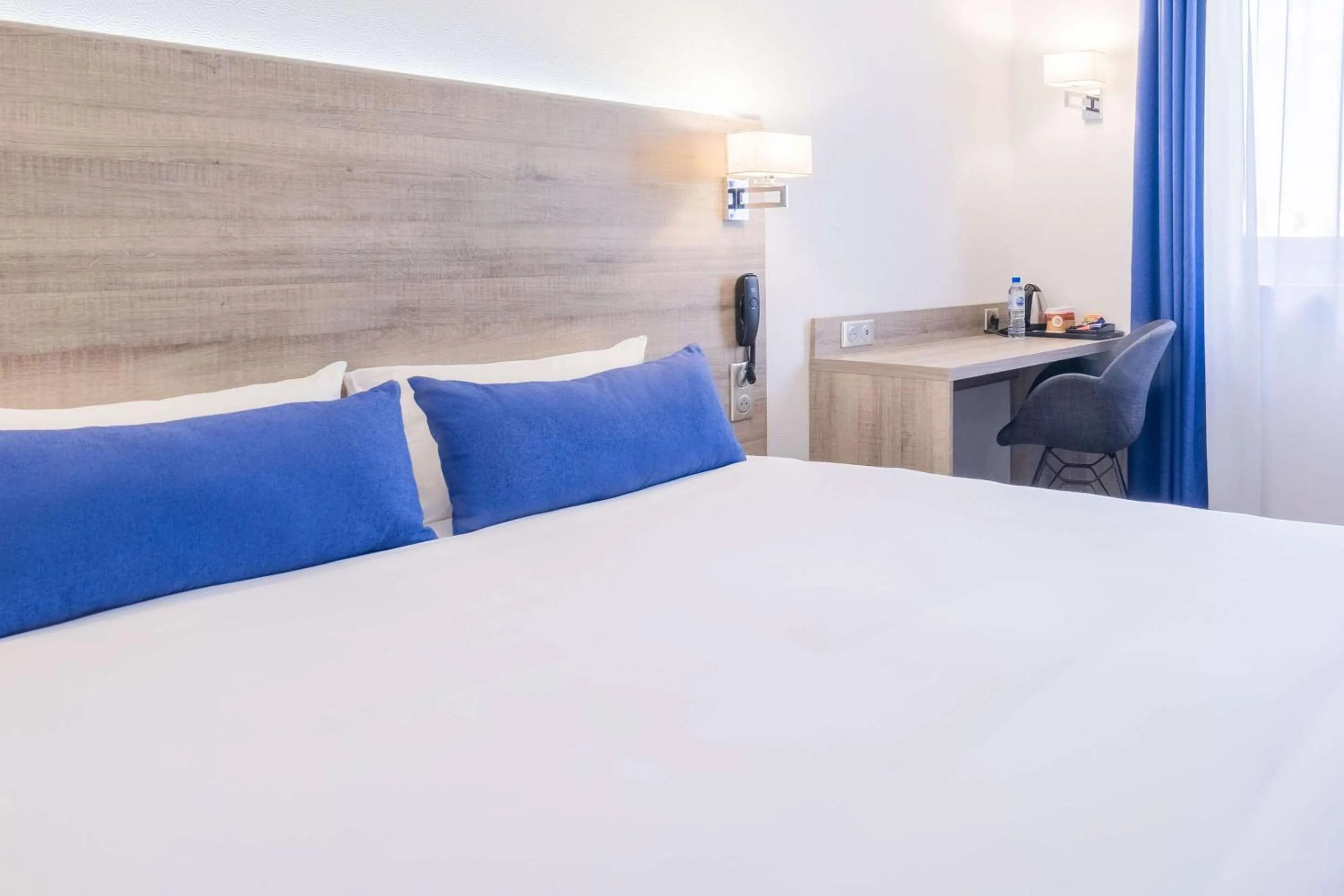 Photo of the whole room, Bed in Hotel Le Circuit Le Mans