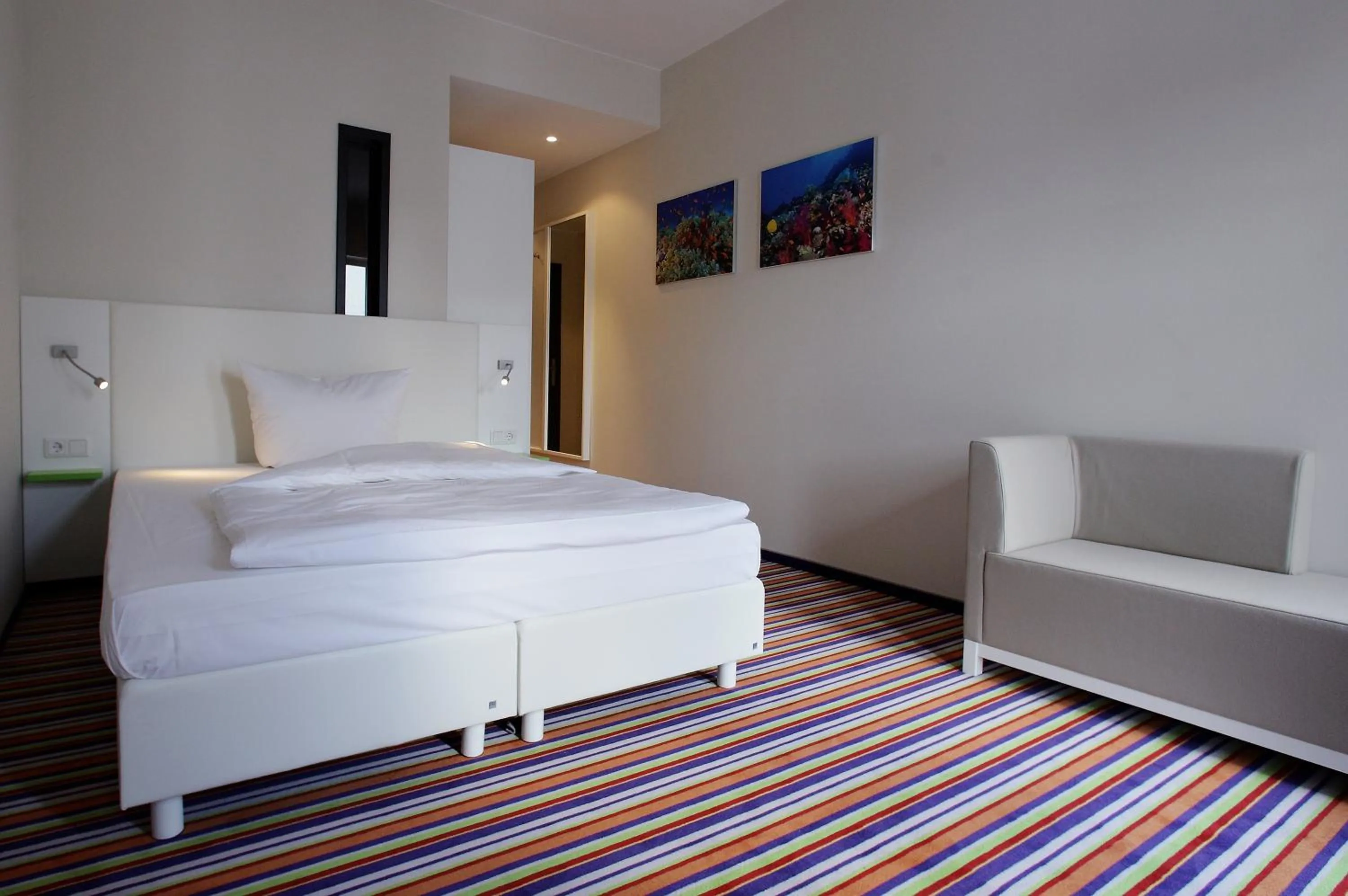 Bed in Friendly Cityhotel Oktopus