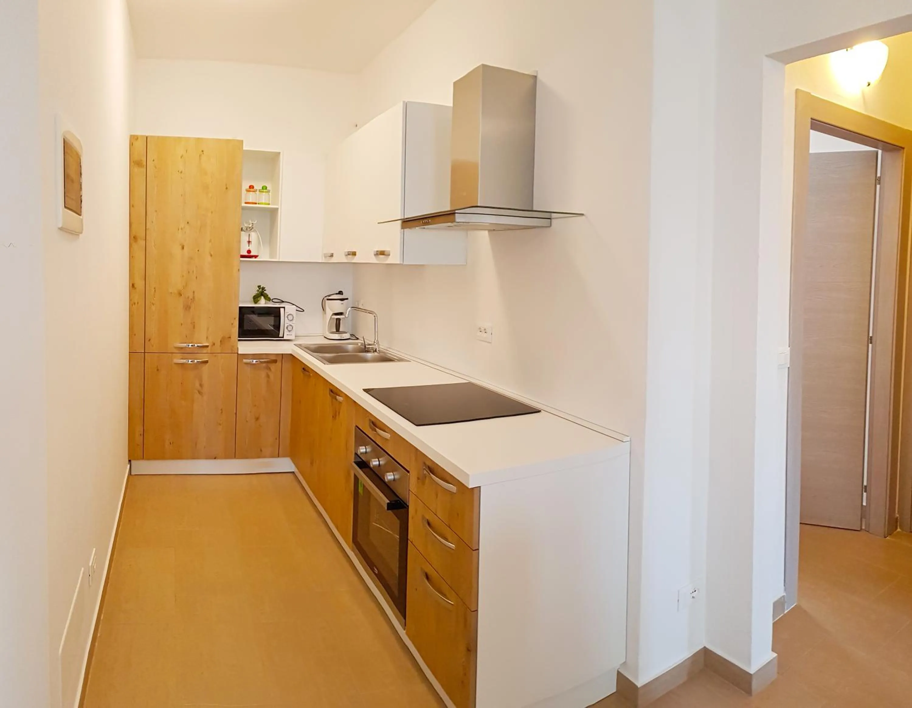 Kitchen or kitchenette in Casa Gina Garden and view by Gardadomusmea
