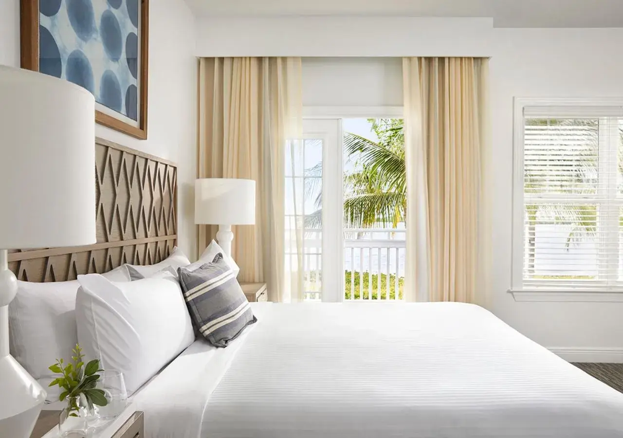 Bed in Parrot Key Hotel & Villas Bed in Parrot Key Hotel & Villas