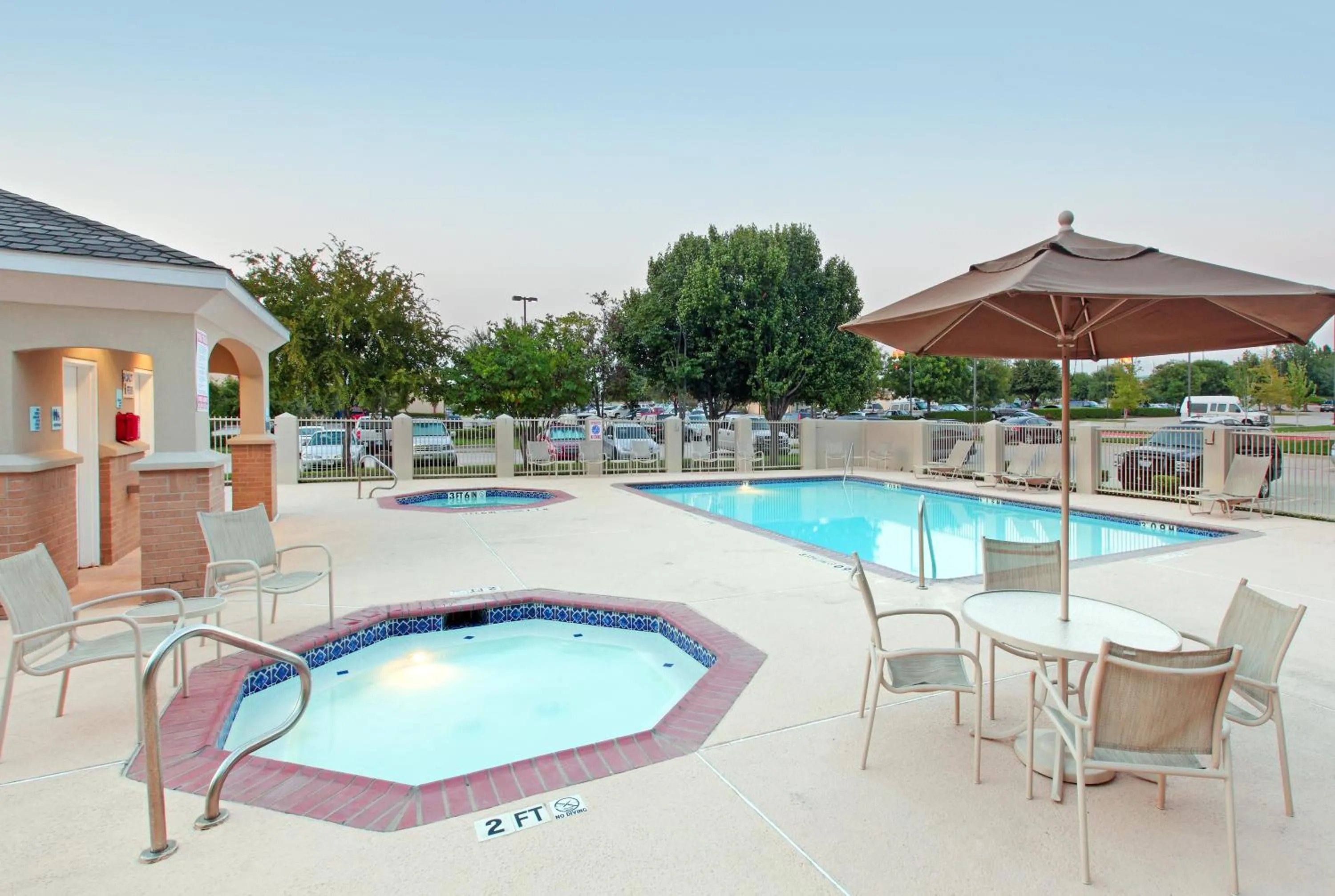 Swimming pool in Holiday Inn Express Hotel and Suites DFW-Grapevine by IHG