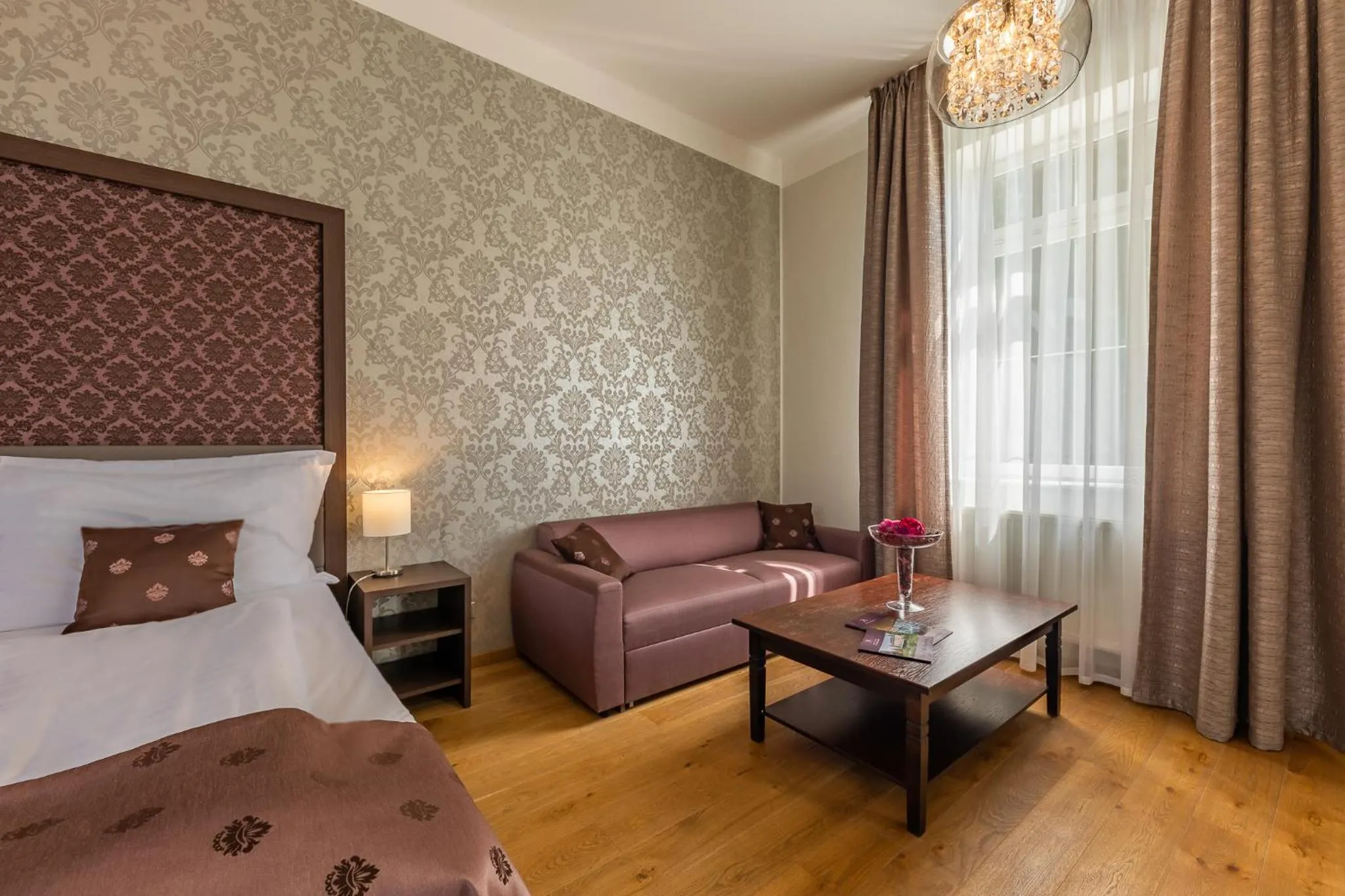 Seating area, Bed in Wellness & Spa hotel Villa Regenhart