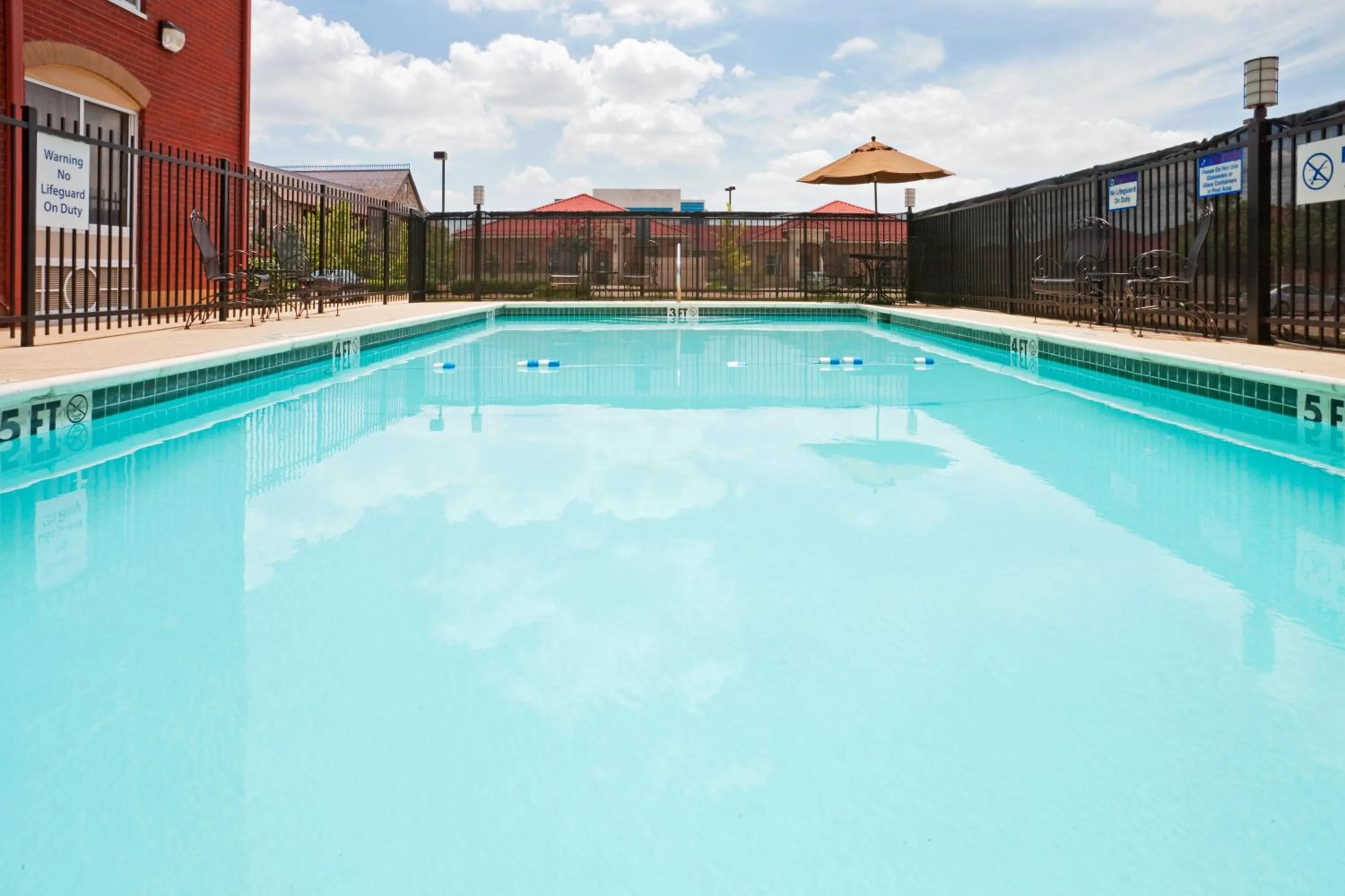 Swimming pool in Holiday Inn Express Hotel & Suites Plano West - Frisco by IHG