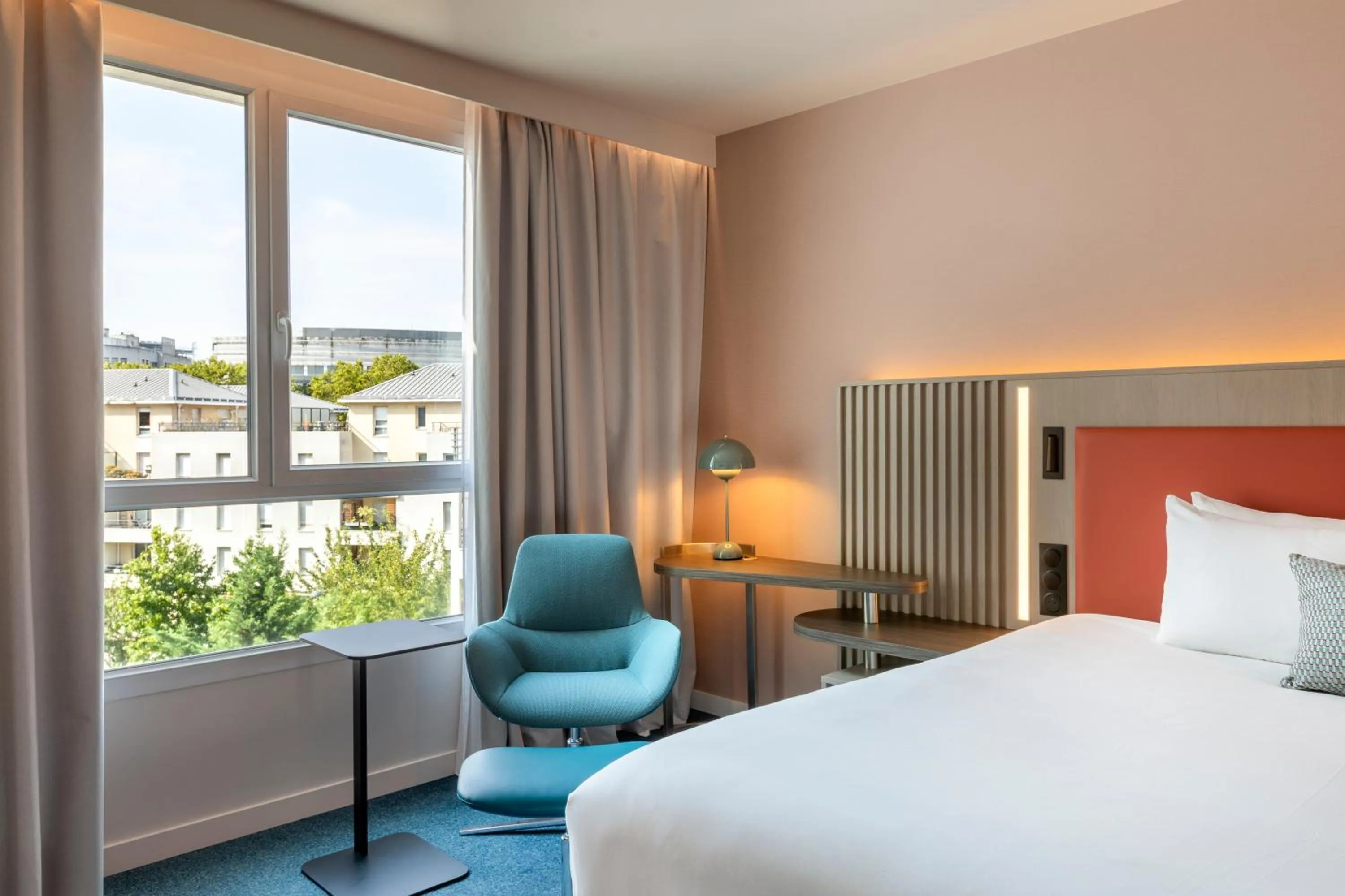 Bed in Courtyard by Marriott Paris Saint Denis