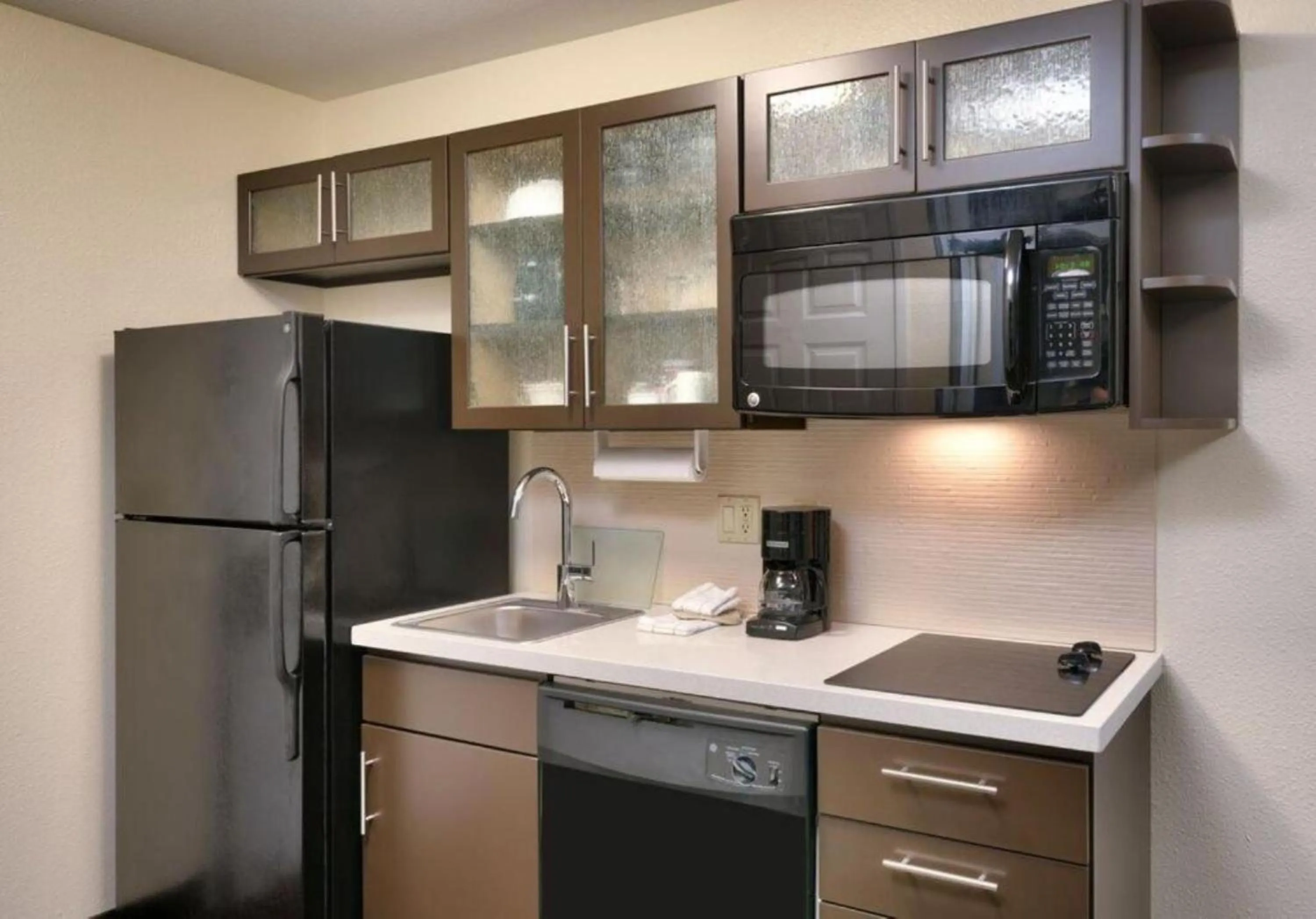 Kitchen or kitchenette in Candlewood Suites Plano East by IHG