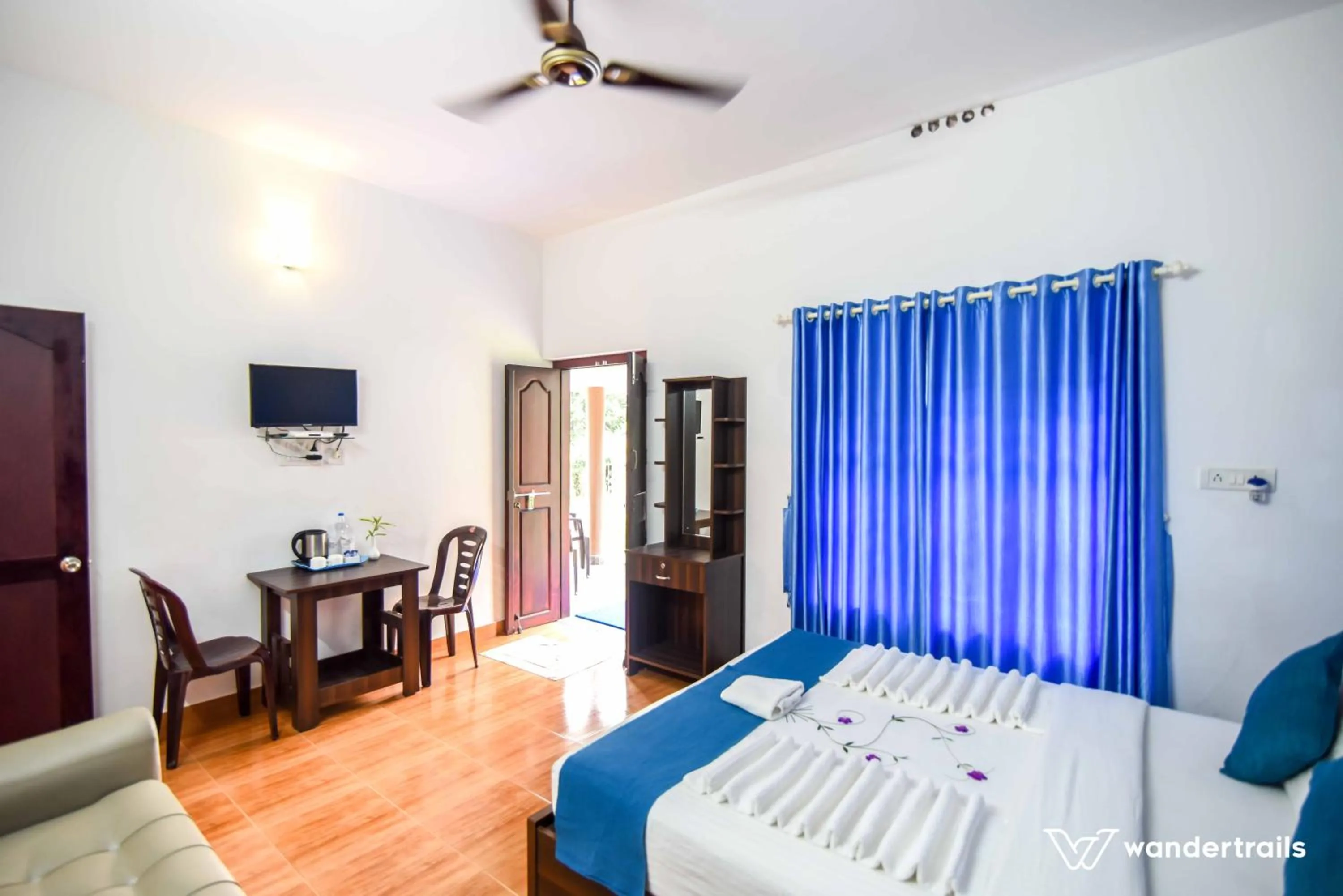 Bed in Wayanad Three Roots Holiday Home Resort