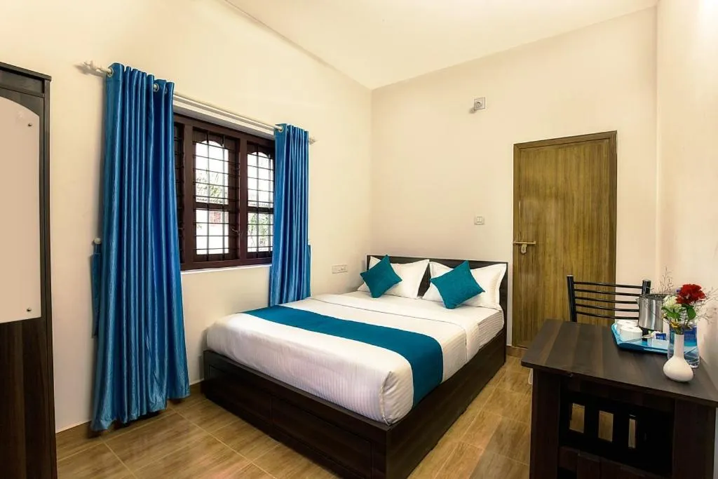 cot, Bed in Wayanad Three Roots Holiday Home Resort