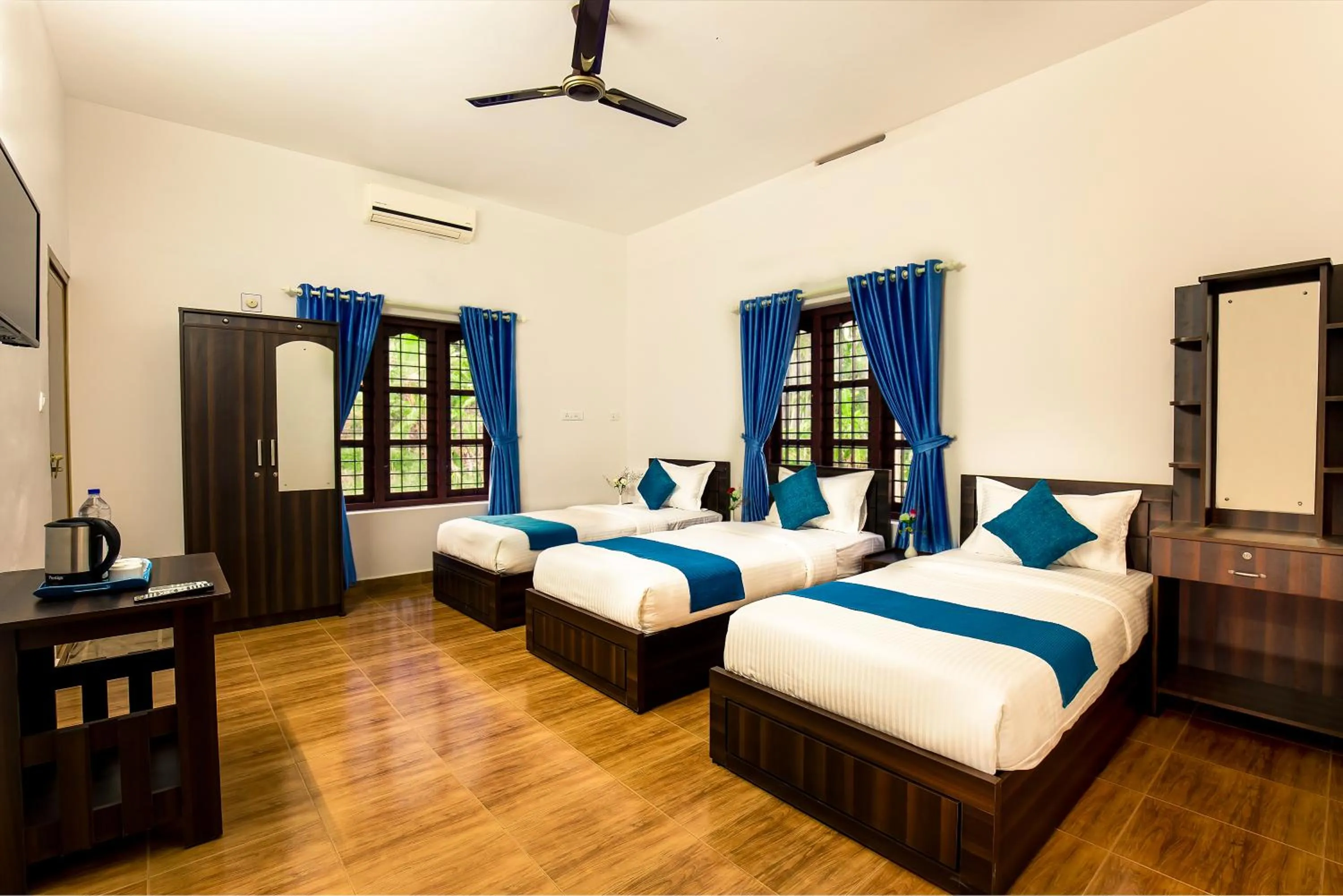 Bed in Wayanad Three Roots Holiday Home Resort