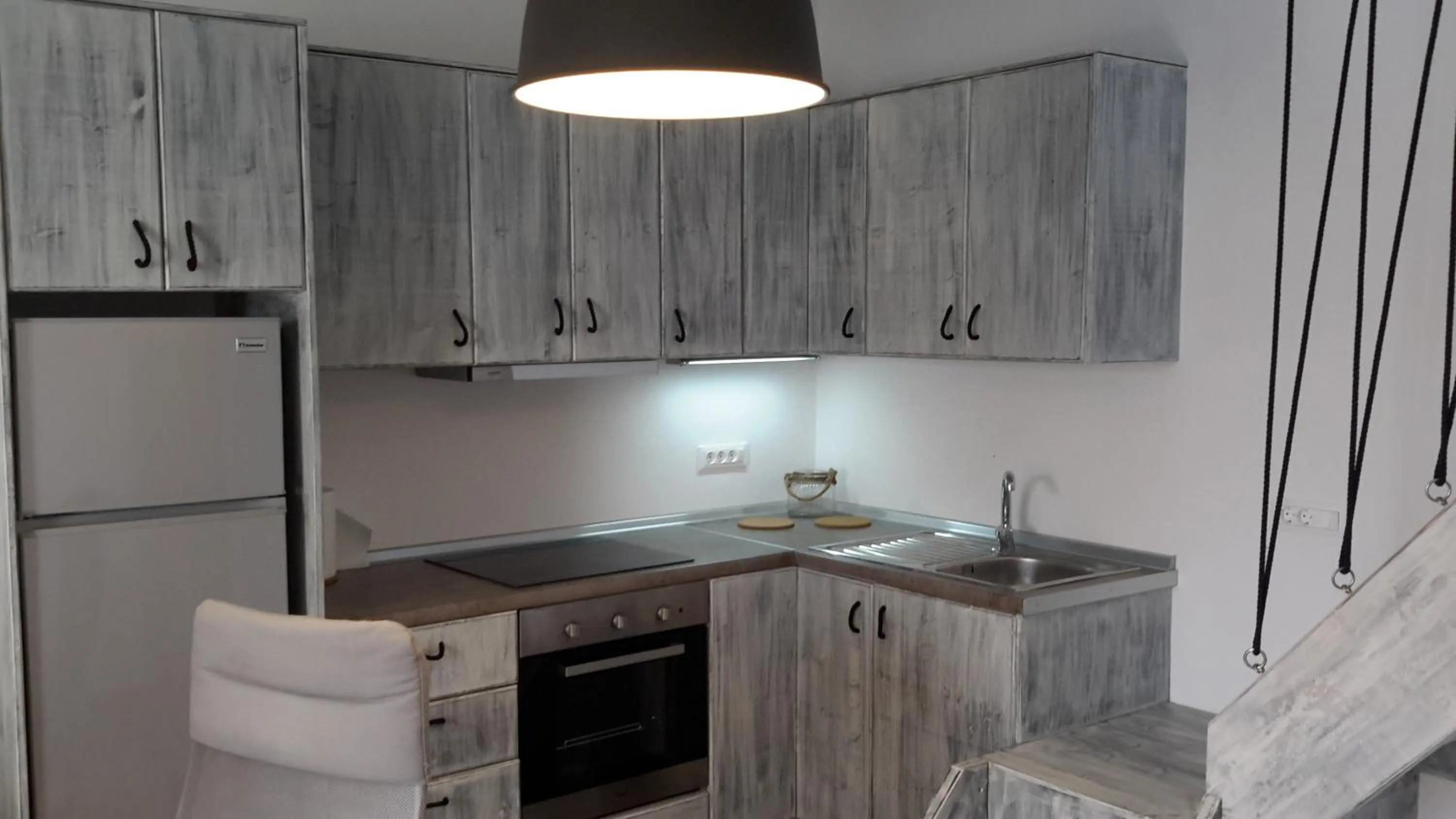 Kitchen or kitchenette in Olive Mykonos Villas