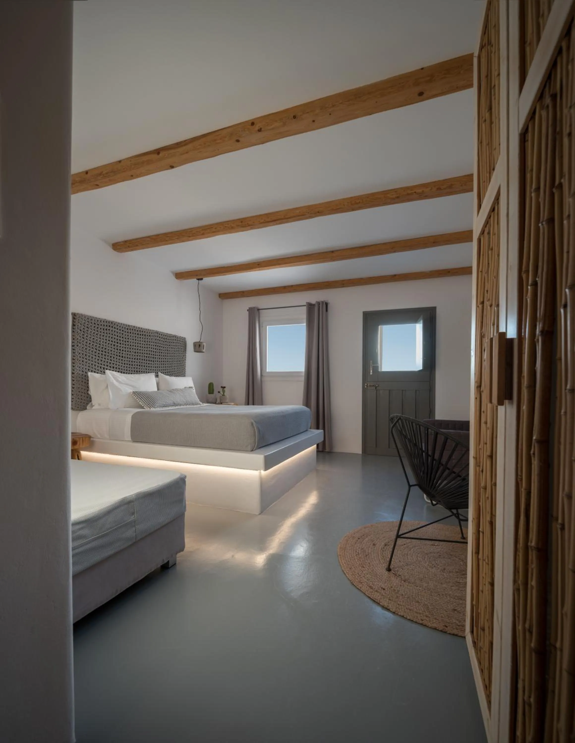 Seating area, Bed in Olive Mykonos Villas