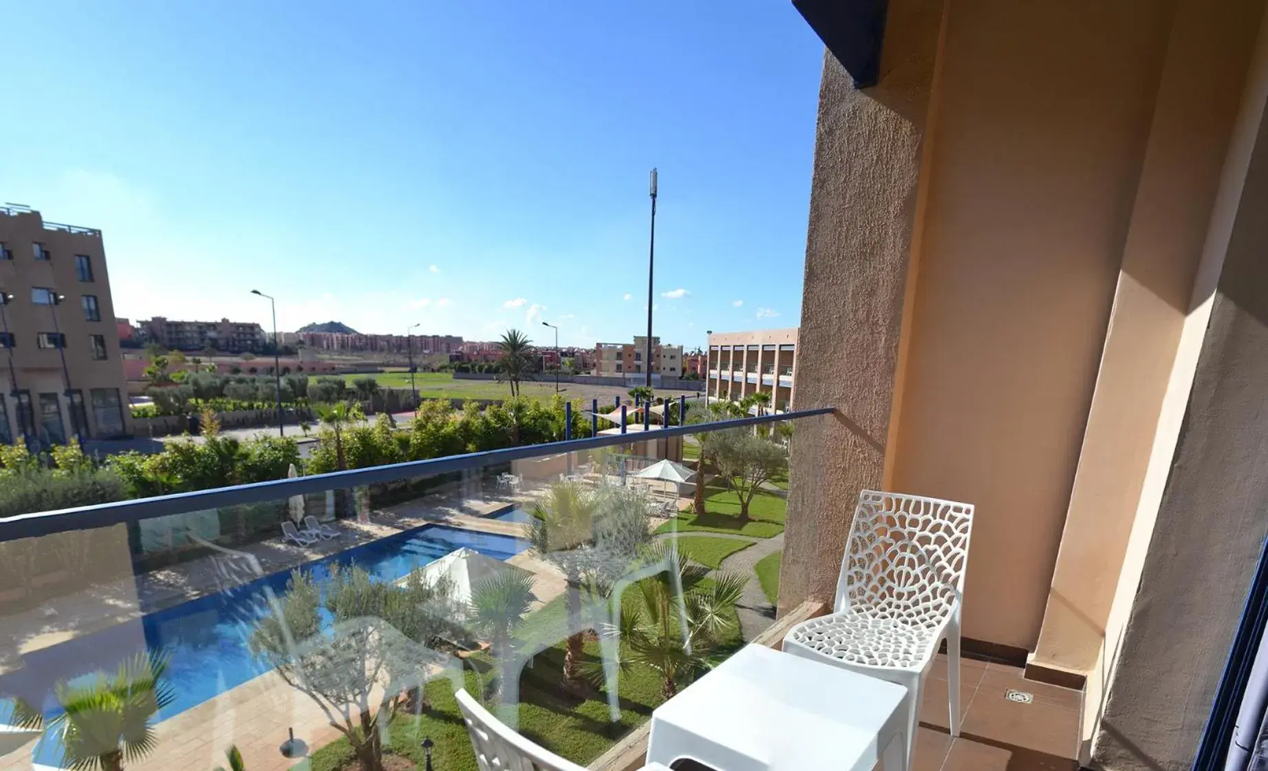 Balcony/Terrace, Pool View in Wazo Hotel