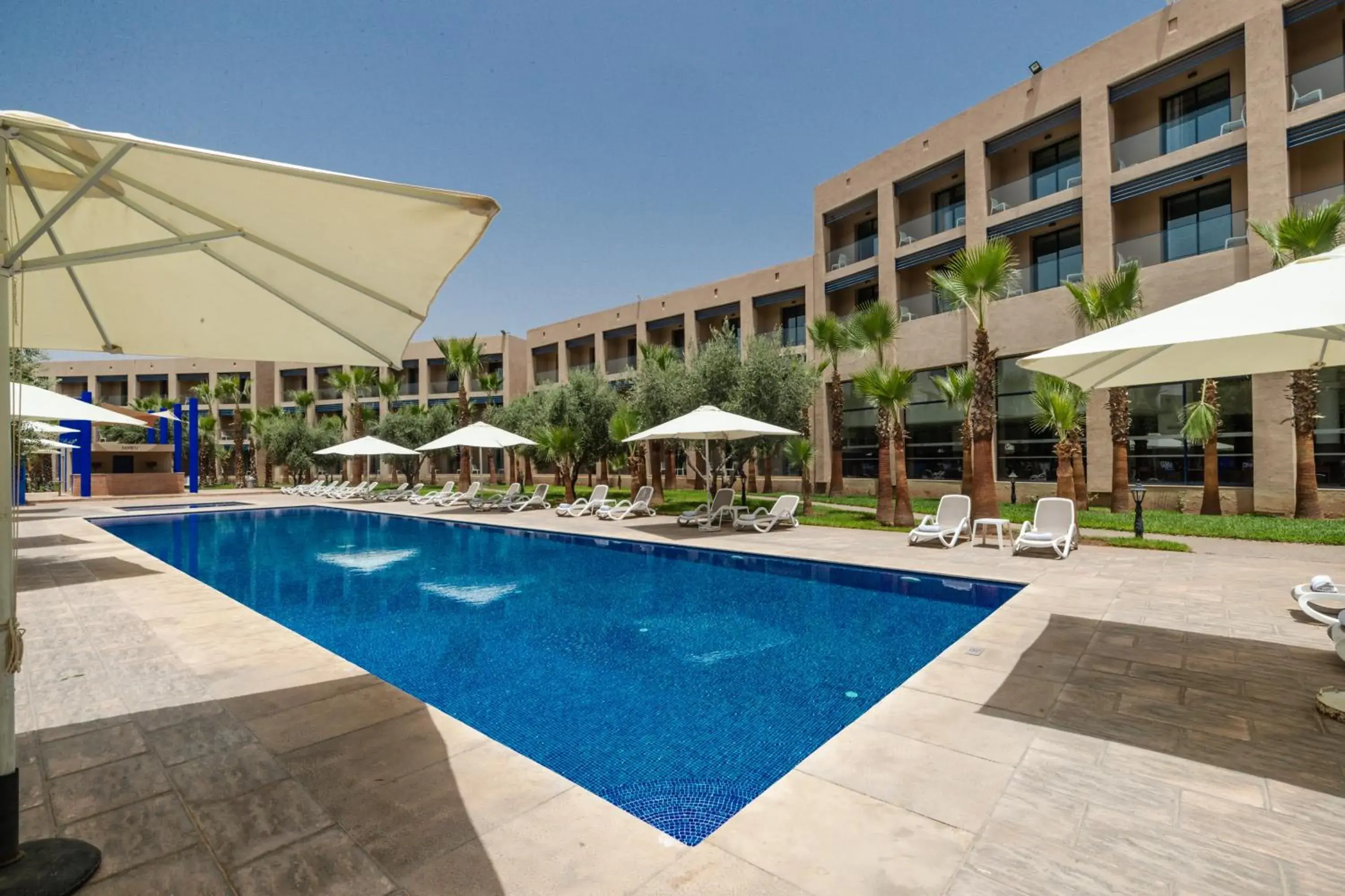 Swimming pool, Property Building in Wazo Hotel