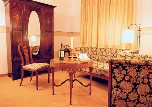 Seating area, Bed in Hotel Buchenhof