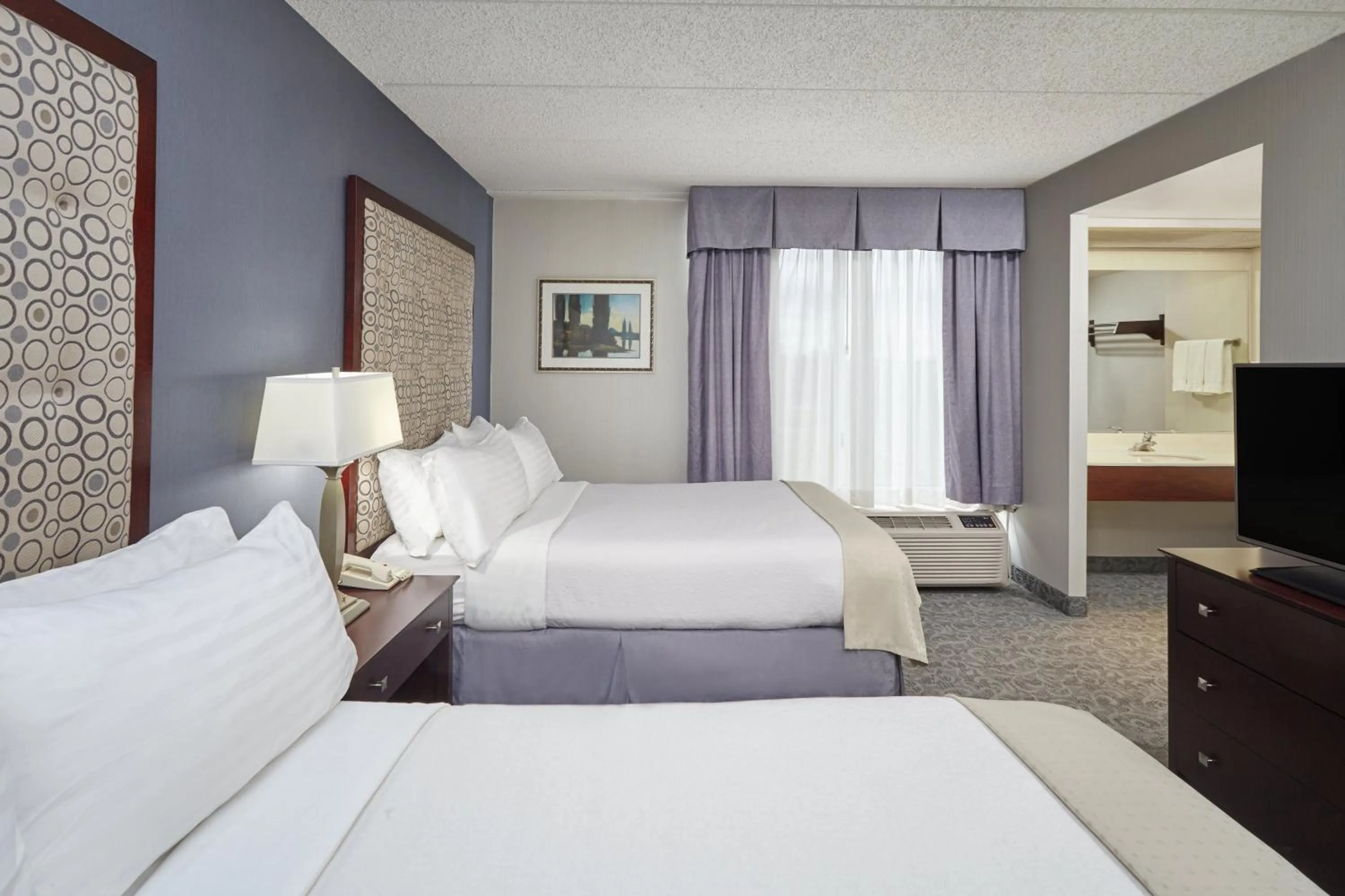 Bedroom, Bed in Holiday Inn & Suites Chicago-Carol Stream Wheaton by IHG