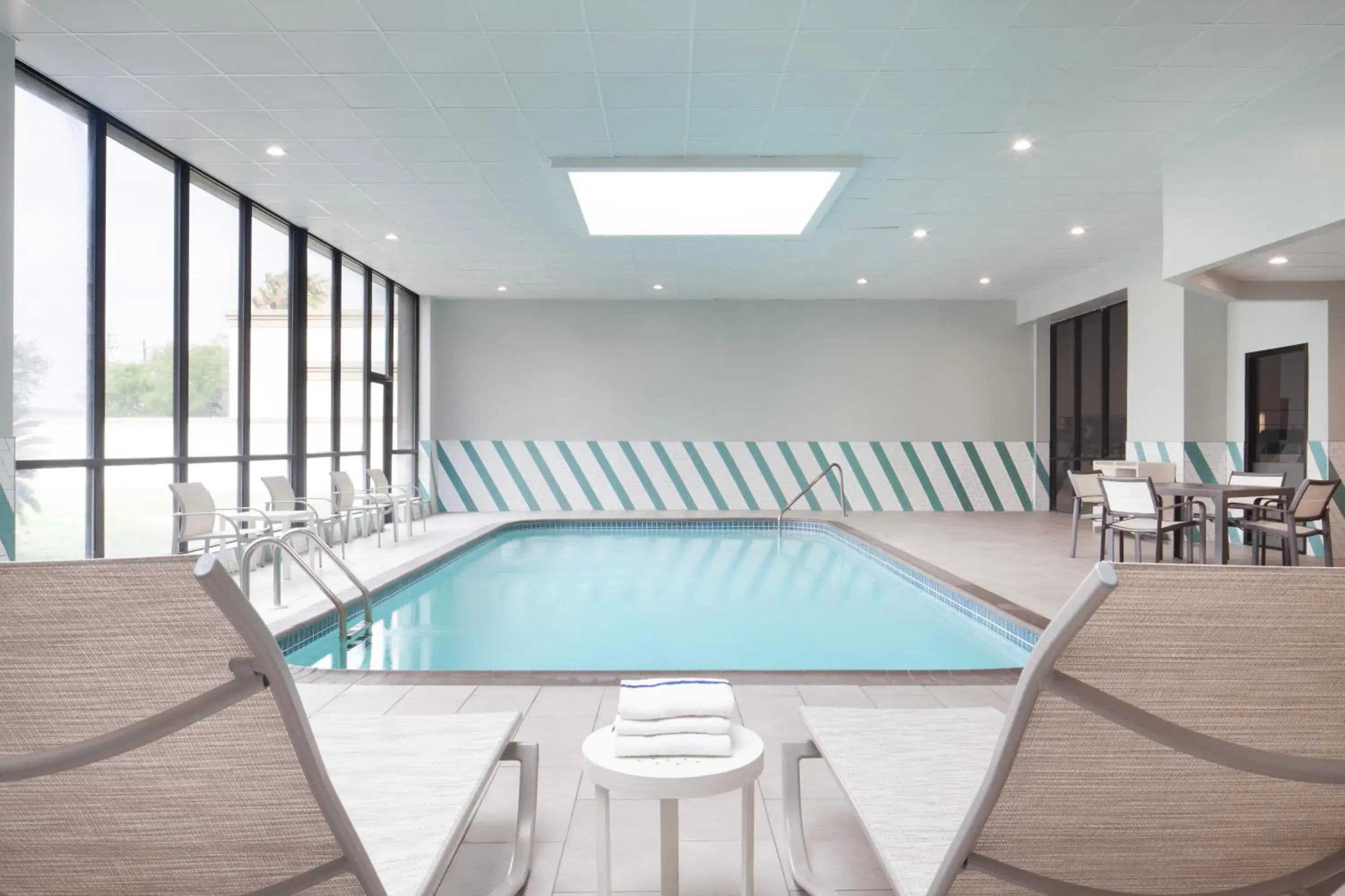 Swimming pool in Holiday Inn Corpus Christi Arpt & Conf Ctr by IHG Swimming pool in Holiday Inn Corpus Christi Arpt & Conf Ctr by IHG