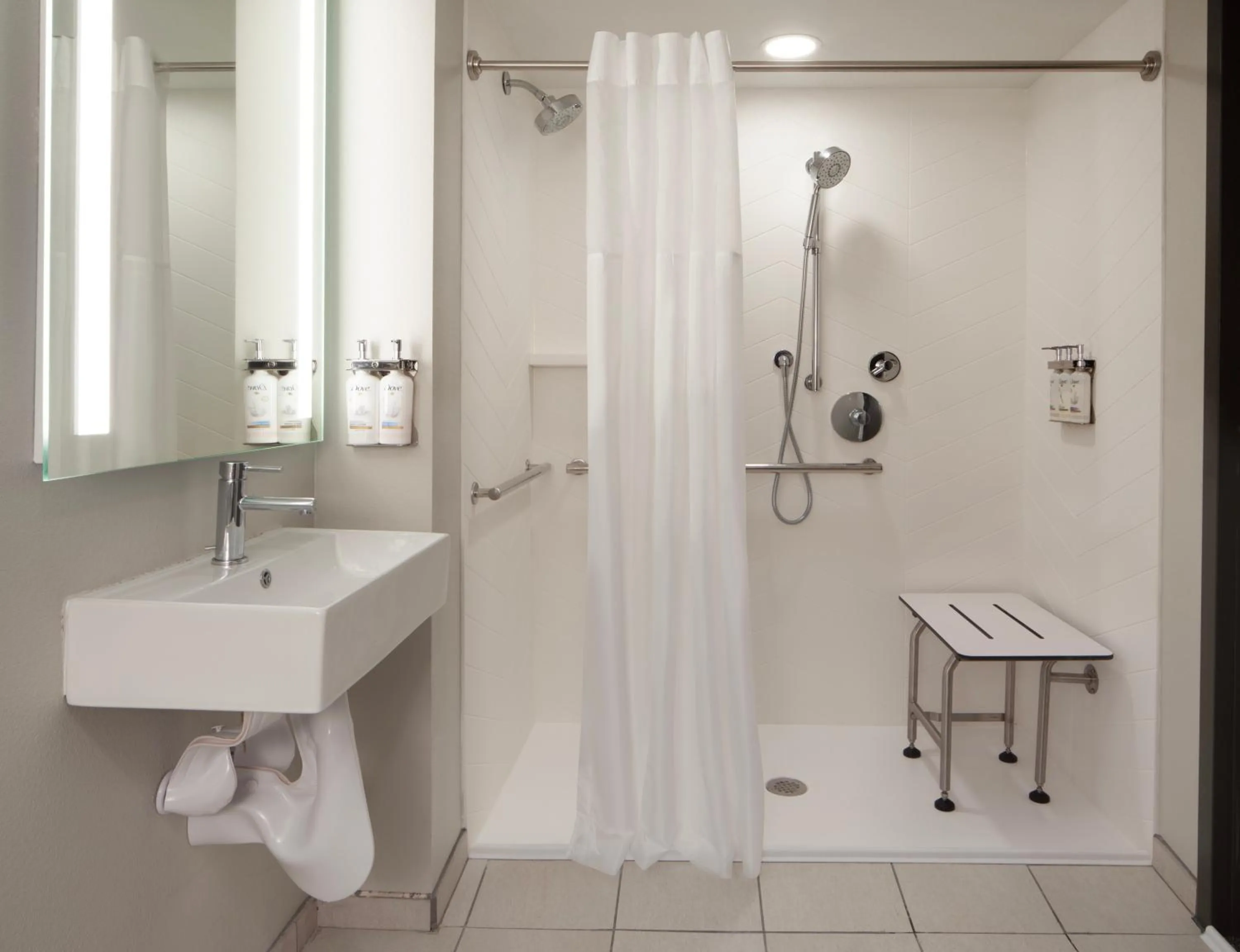 Shower in Holiday Inn Corpus Christi Arpt & Conf Ctr by IHG