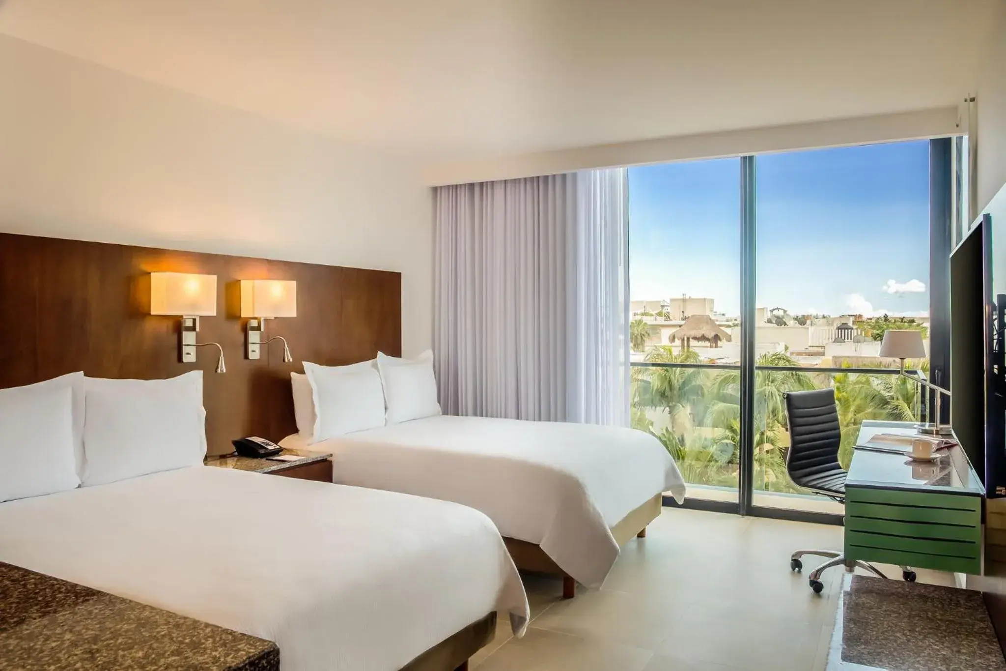 Photo of the whole room, Bed in Fiesta Inn Playa del Carmen Photo of the whole room, Bed in Fiesta Inn Playa del Carmen