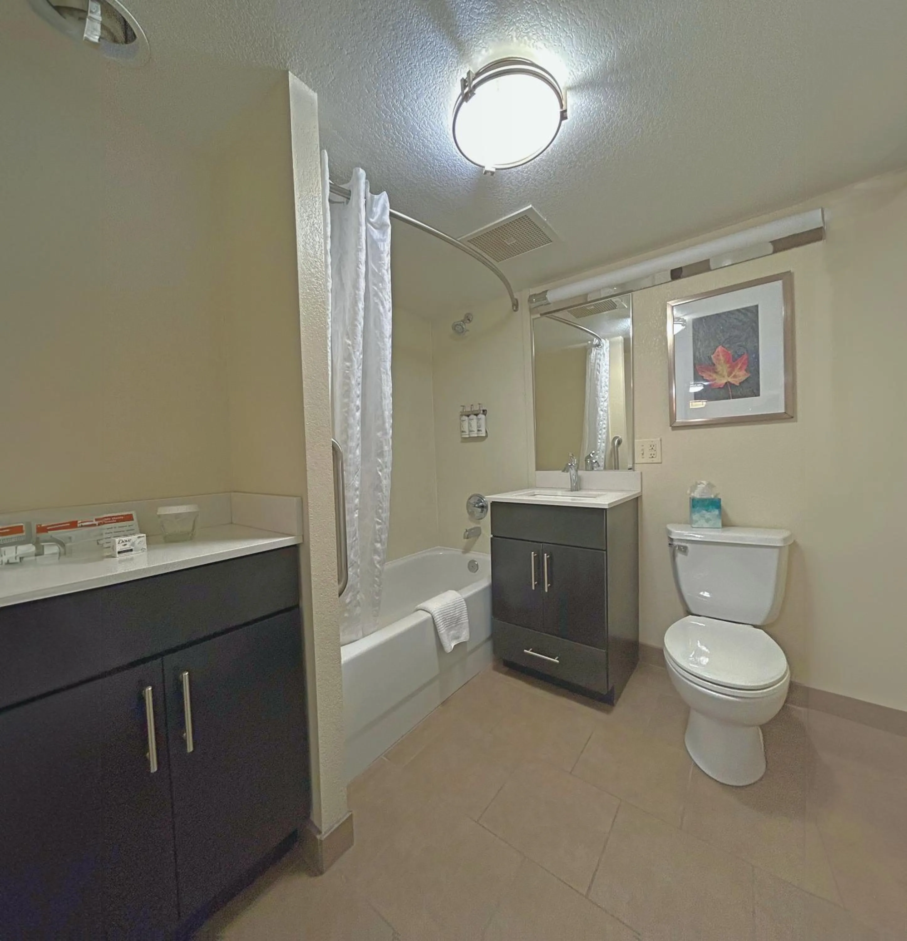 Bathroom in Candlewood Suites Indianapolis Downtown Medical District by IHG