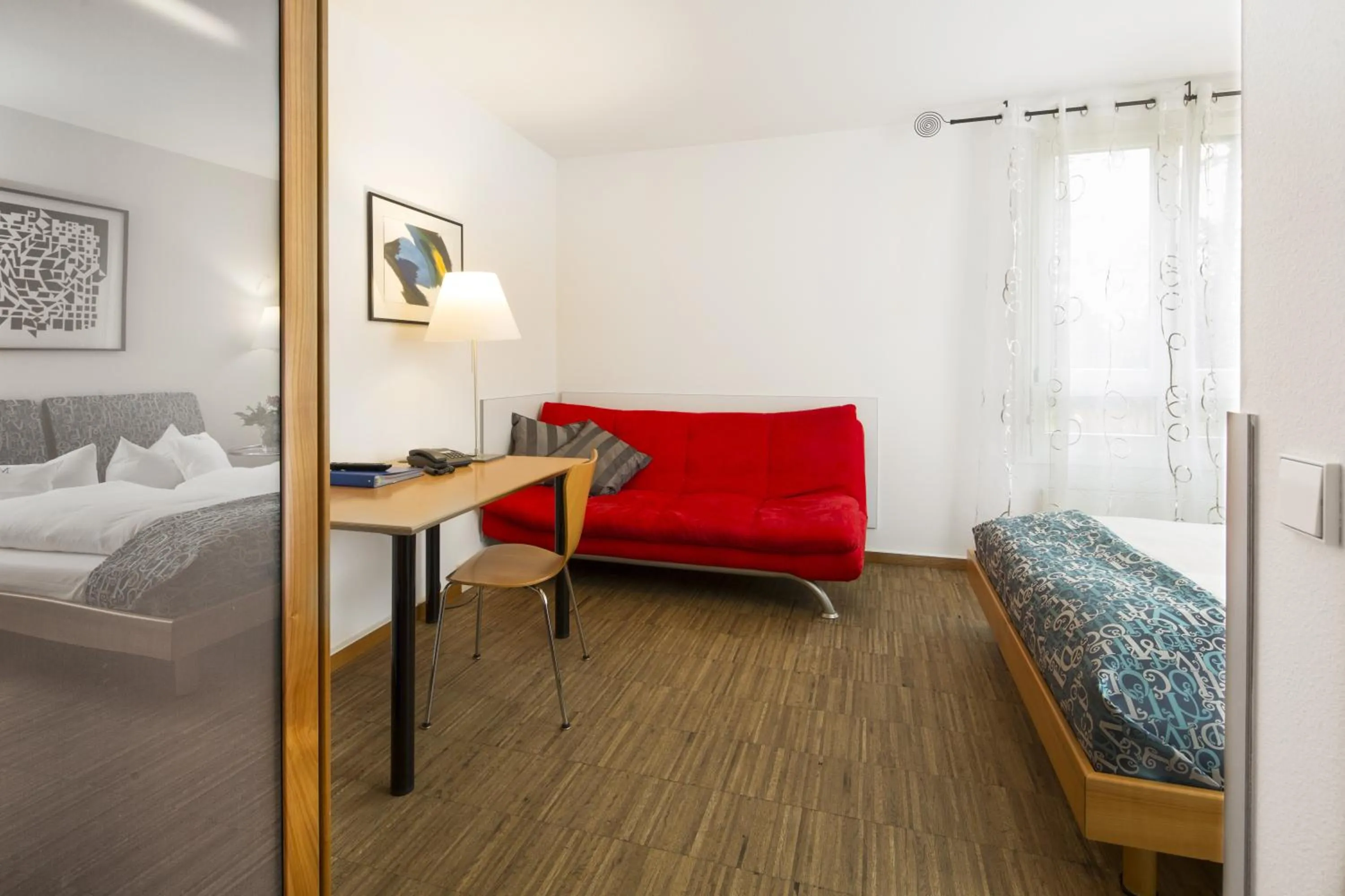 Seating area, Bed in Business & Art Hotel Markgraf