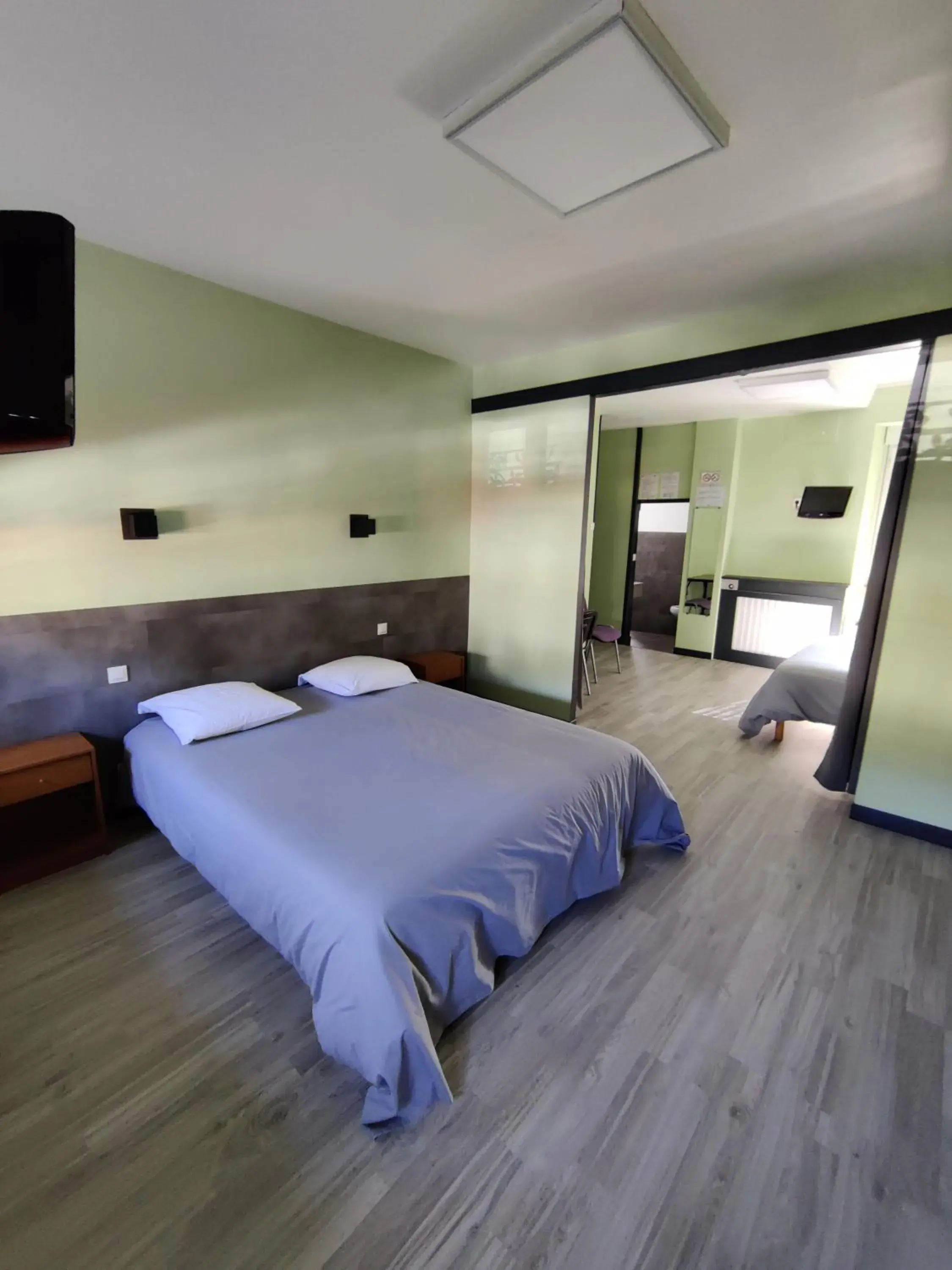 Quadruple Room in Hôtel Saint - Pierre Quadruple Room in Hôtel Saint - Pierre