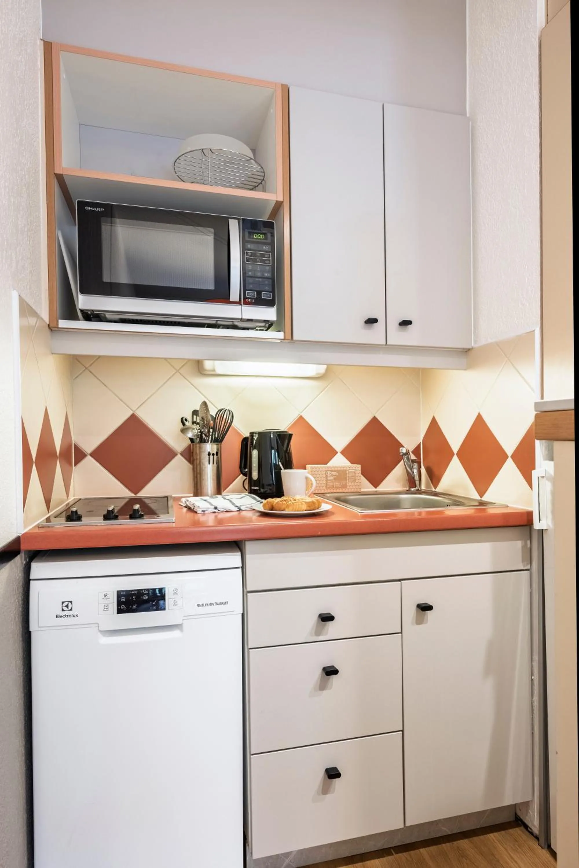 Kitchen or kitchenette in Résidence Pierre & Vacances Les Ravines
