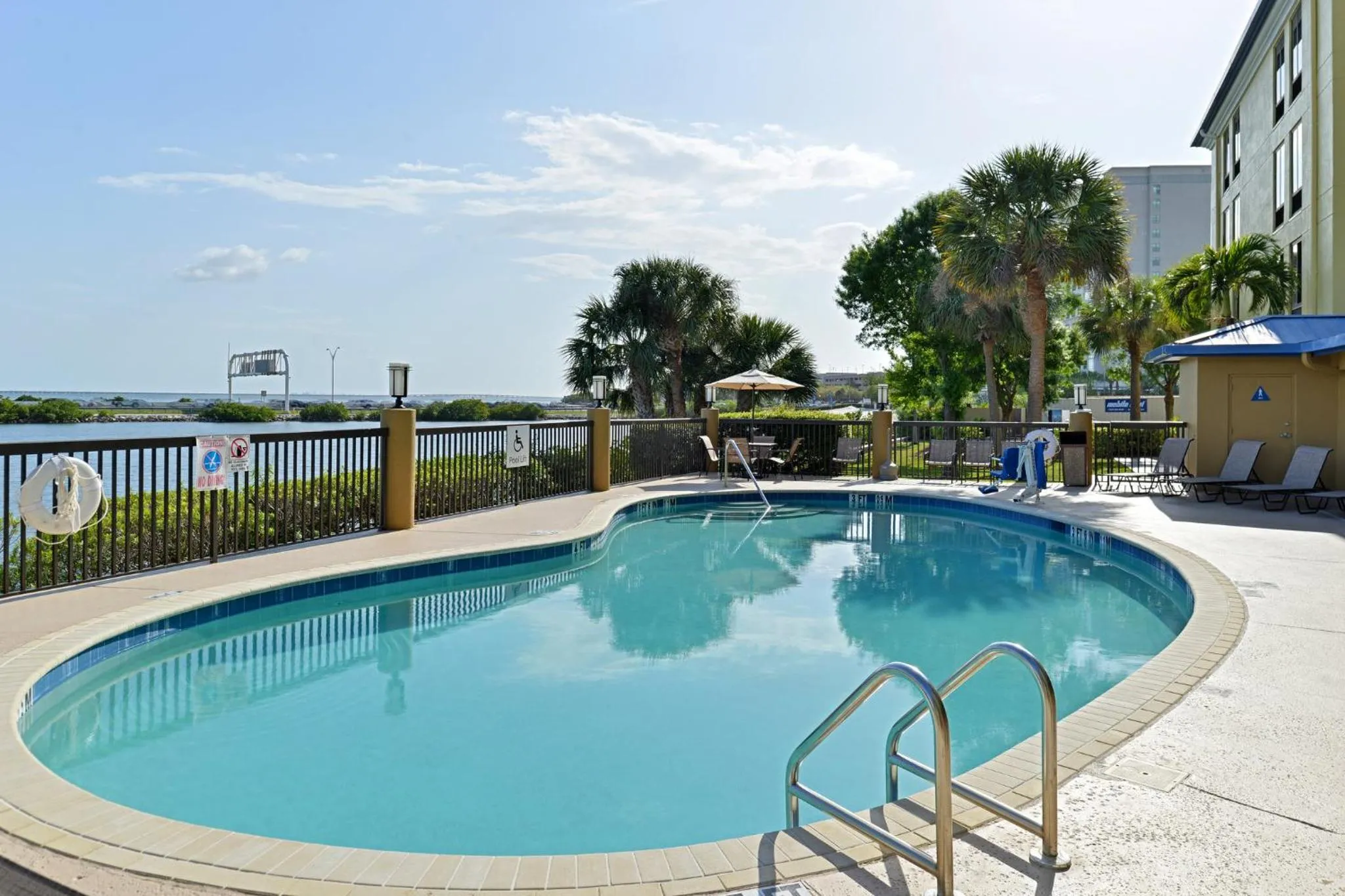 Swimming pool in Holiday Inn Express Hotel & Suites Tampa-Rocky Point Island by IHG