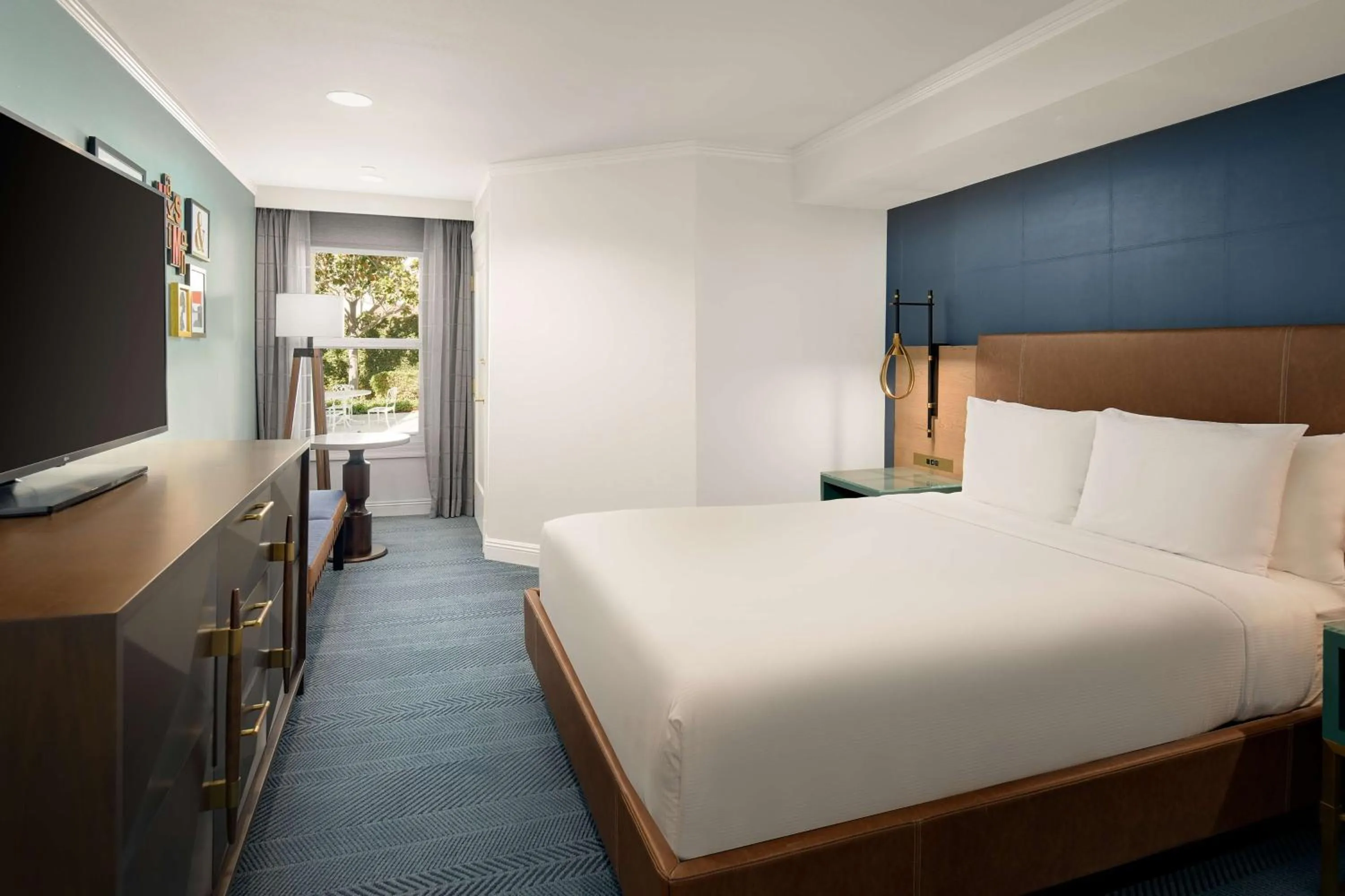 Bed in Hayes Mansion San Jose, Curio Collection by Hilton