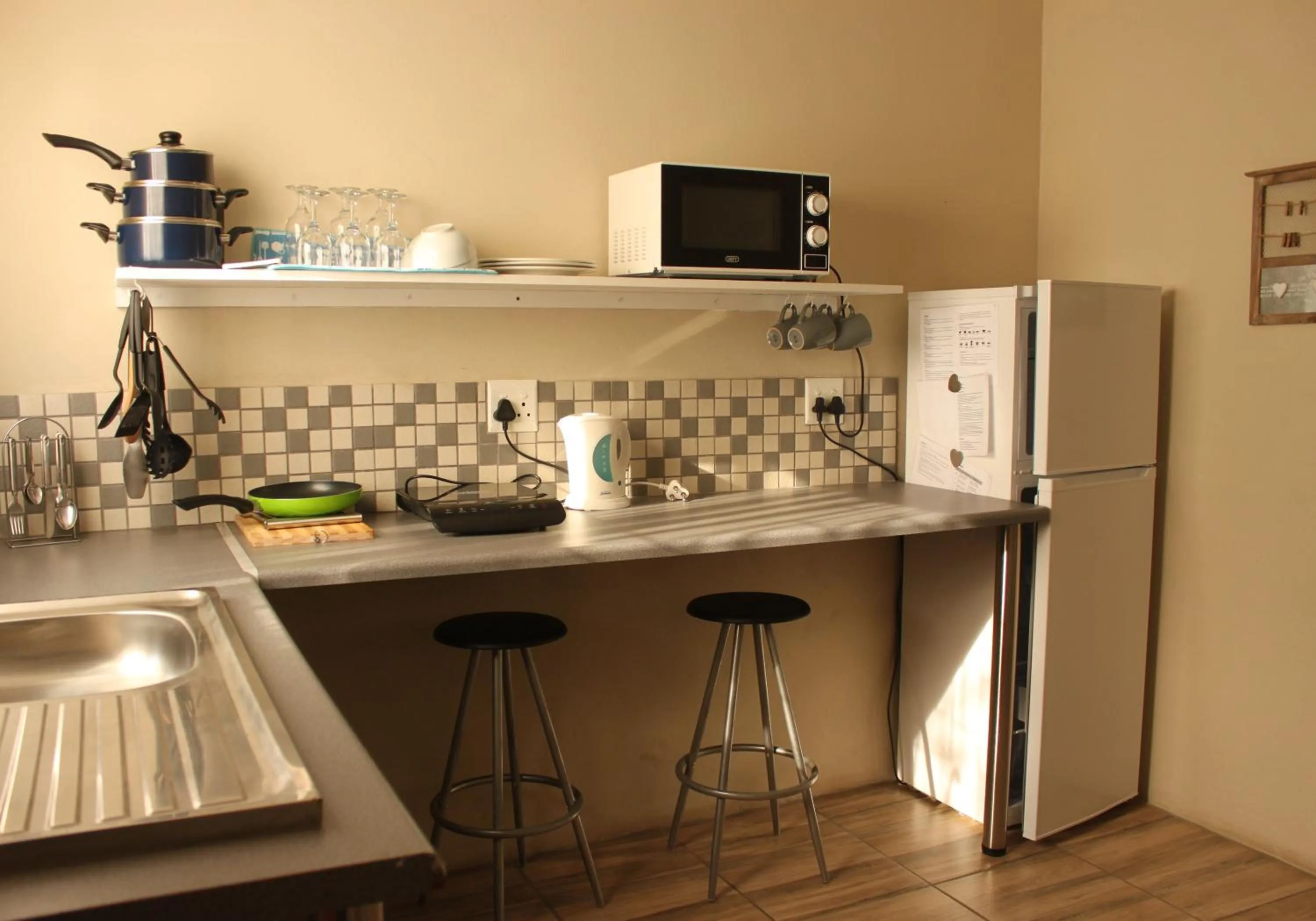Kitchen or kitchenette in khaya4u Guesthouse
