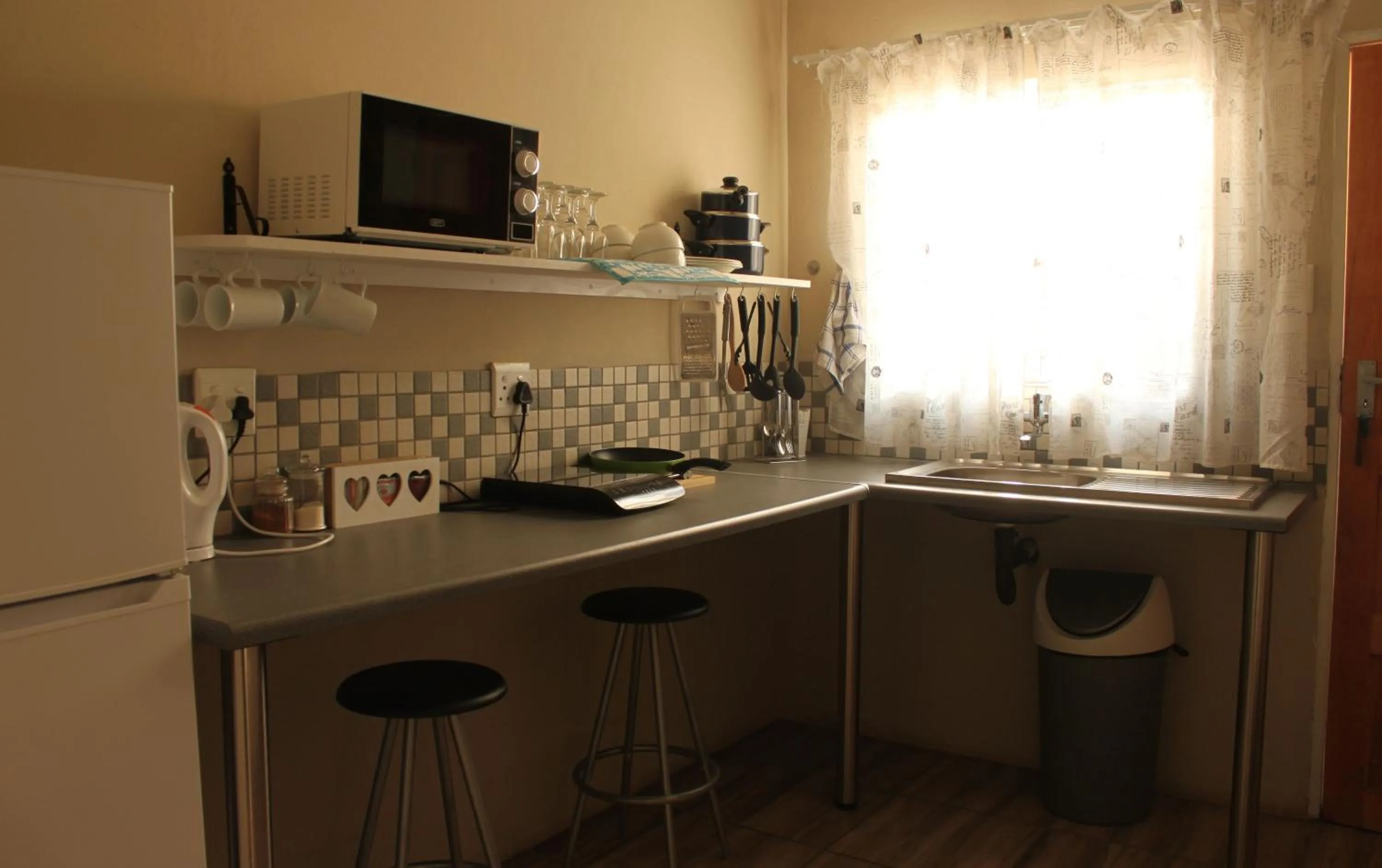 Kitchen or kitchenette in khaya4u Guesthouse