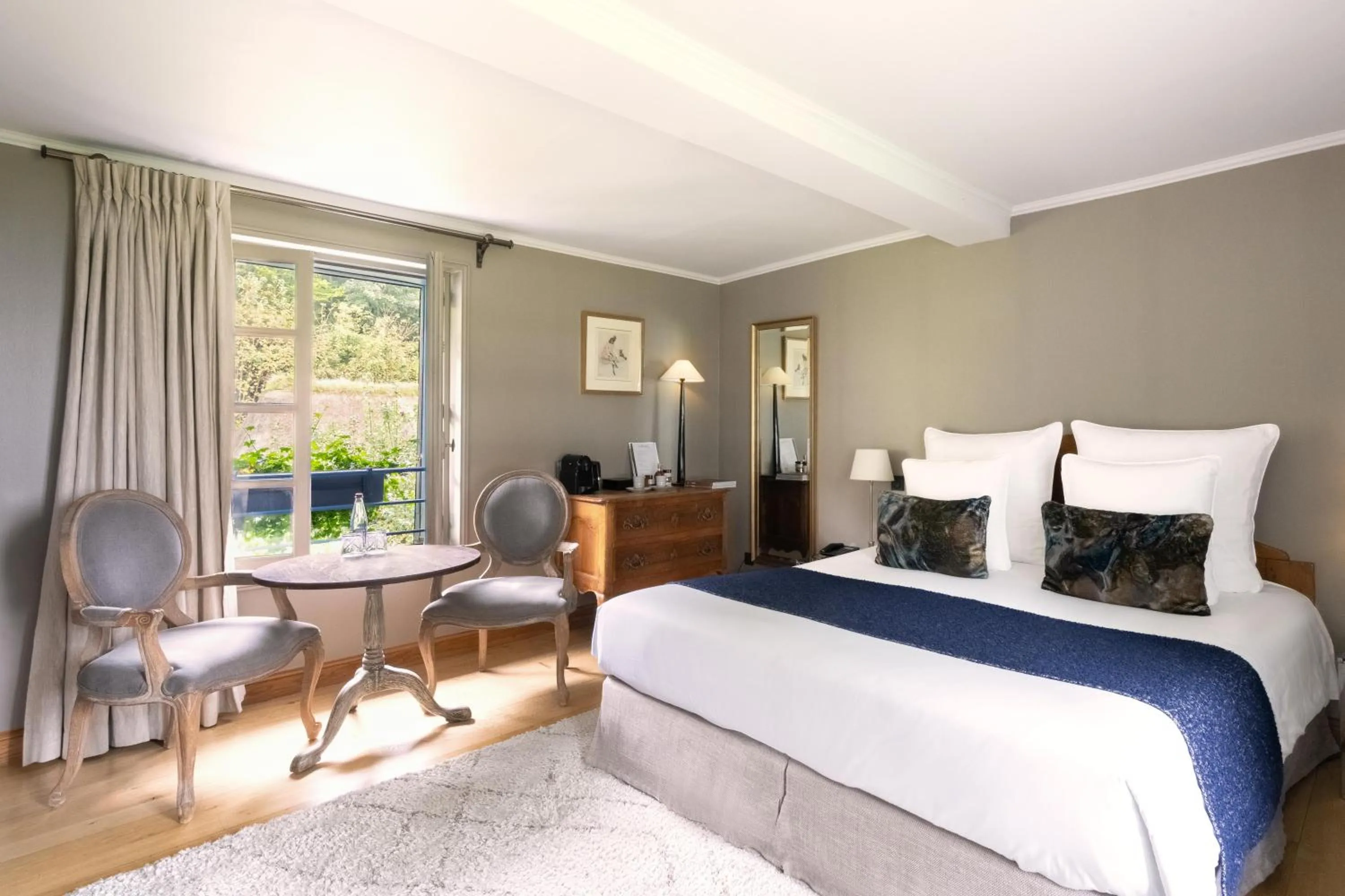 Bedroom, Bed in La Ferme Saint Simeon Hotel & Spa - Relais & Chateaux