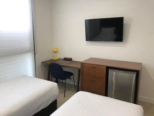 Bed in Whitehorse Apartments Hotel