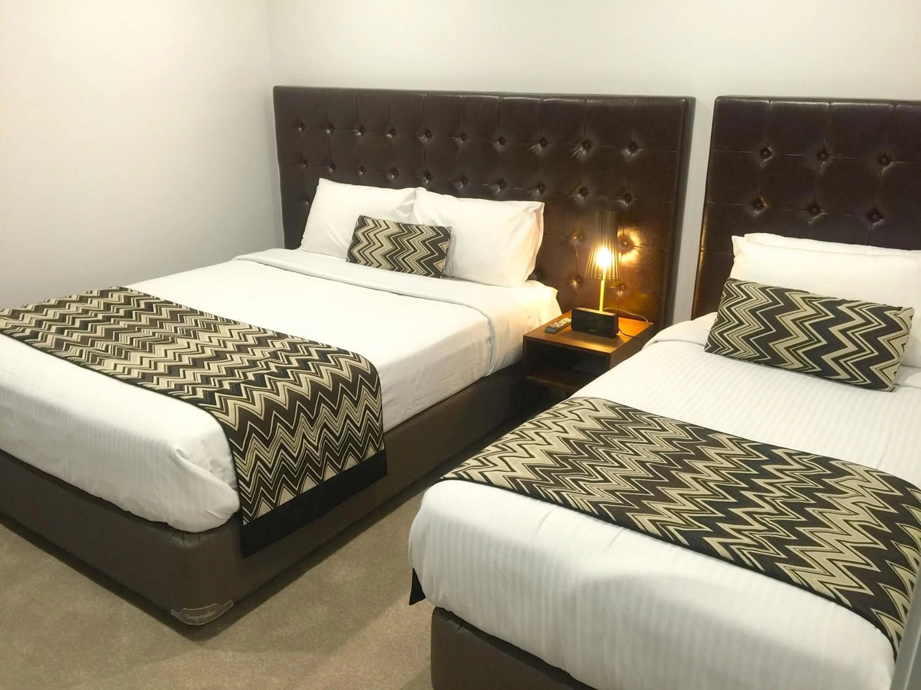 Bedroom, Bed in Whitehorse Apartments Hotel