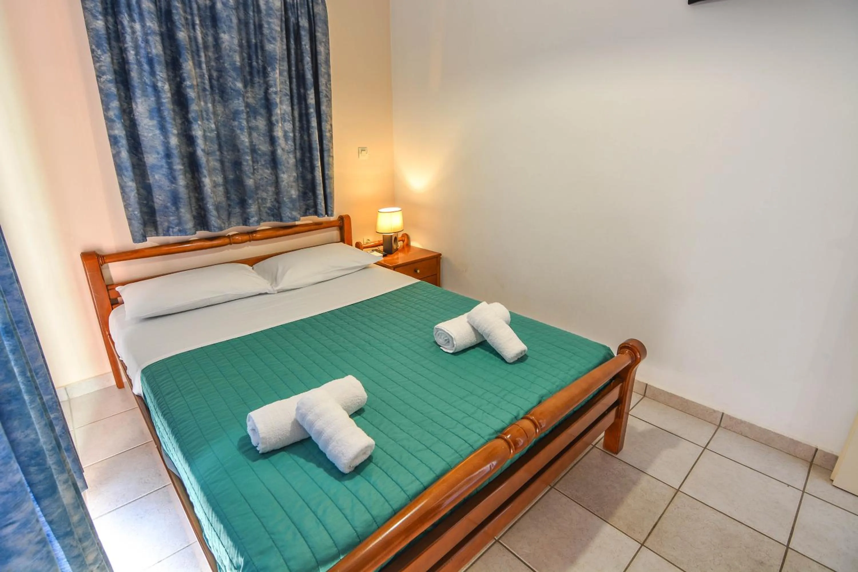 Bed in Epavlis Apartments